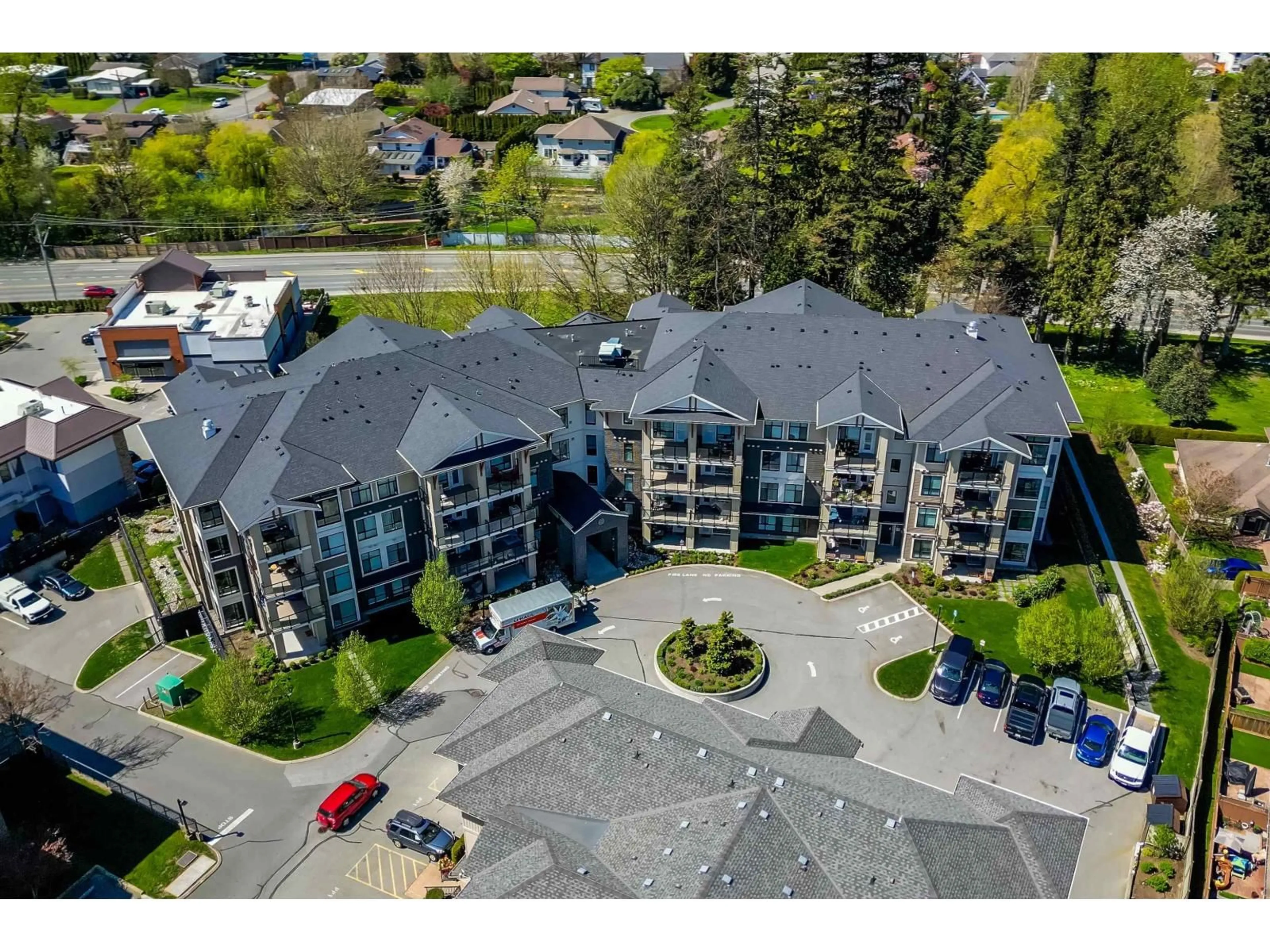 A pic from outside/outdoor area/front of a property/back of a property/a pic from drone, unknown for 215 - 45761 STEVENSON ROAD, Chilliwack British Columbia V2R0Y7