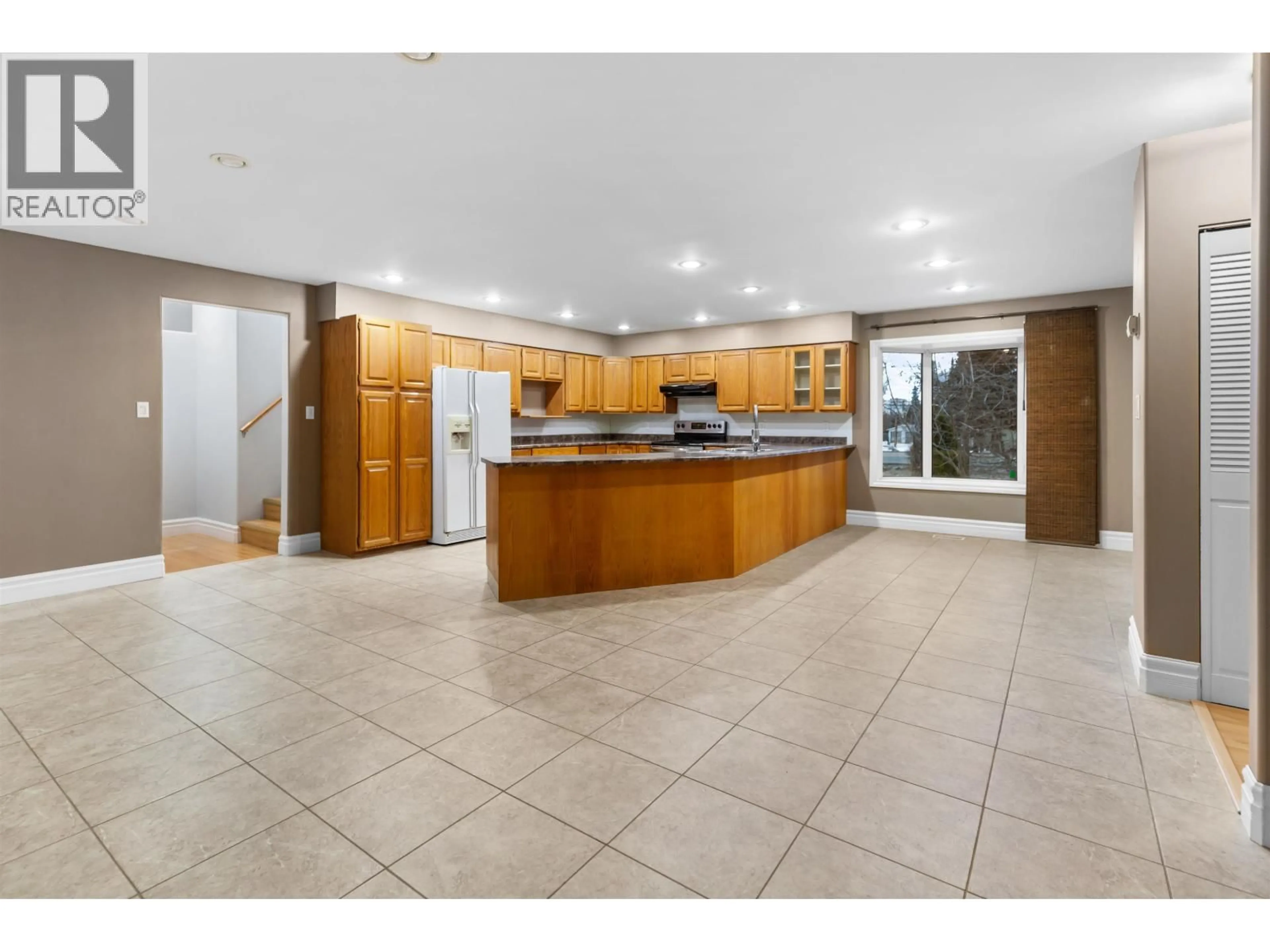 Open concept kitchen, ceramic/tile floor for 7791 KELLY ROAD, Prince George British Columbia V2K2H5