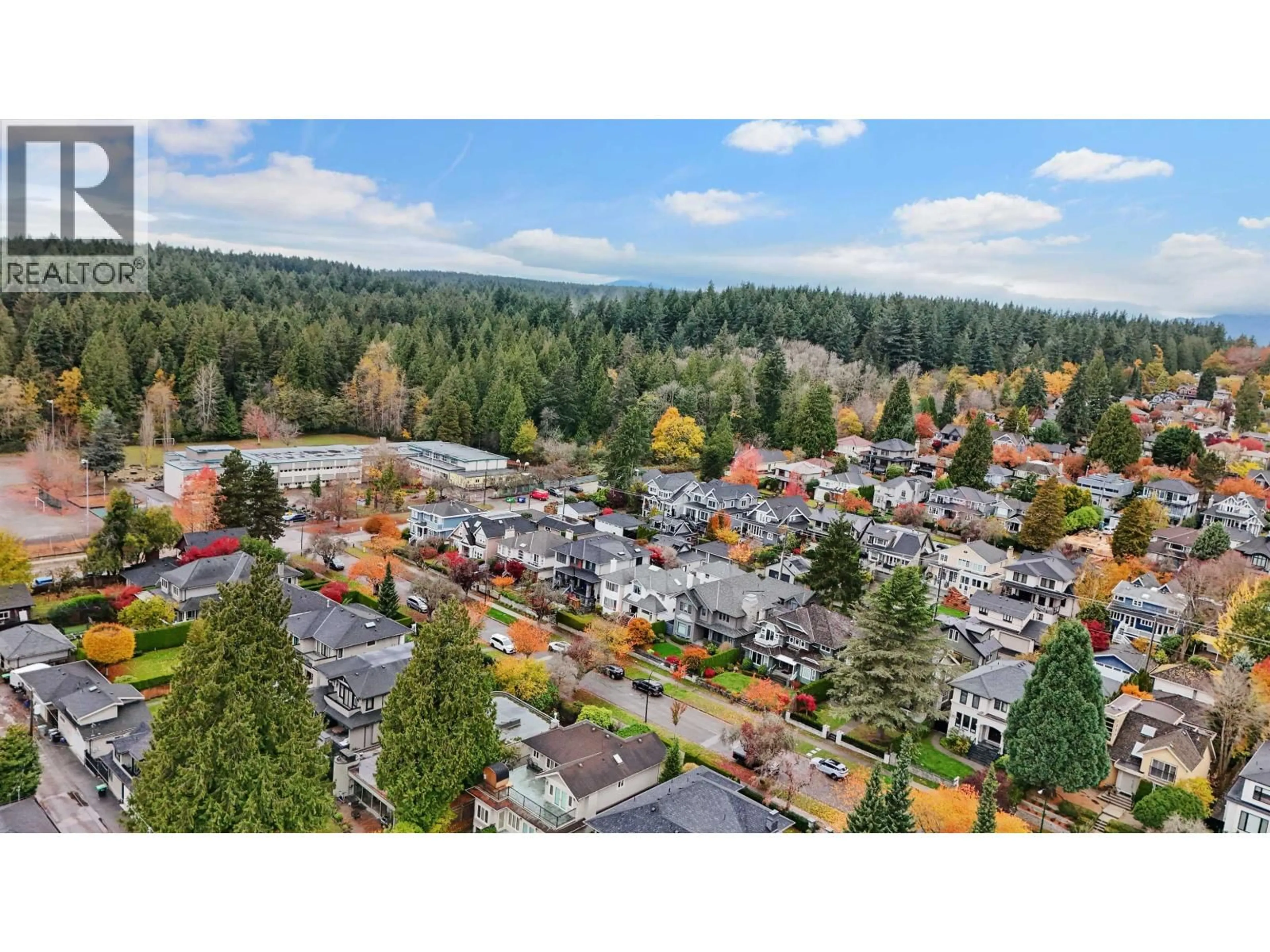 A pic from outside/outdoor area/front of a property/back of a property/a pic from drone, forest/trees view for 4053 38TH AVENUE, Vancouver British Columbia V6N2Y8