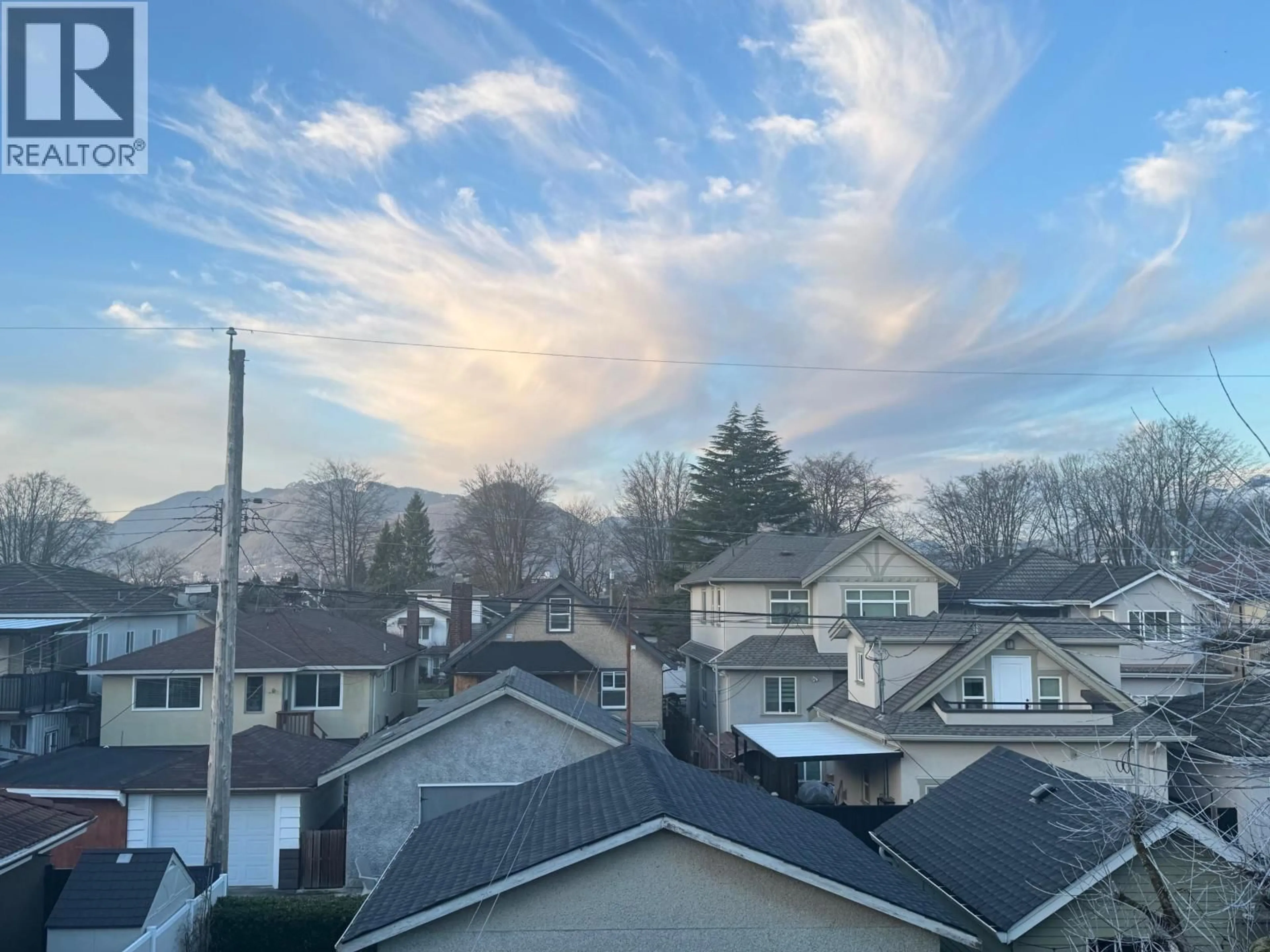 A pic from outside/outdoor area/front of a property/back of a property/a pic from drone, mountain view for 2621 KITCHENER STREET, Vancouver British Columbia V5K3C9
