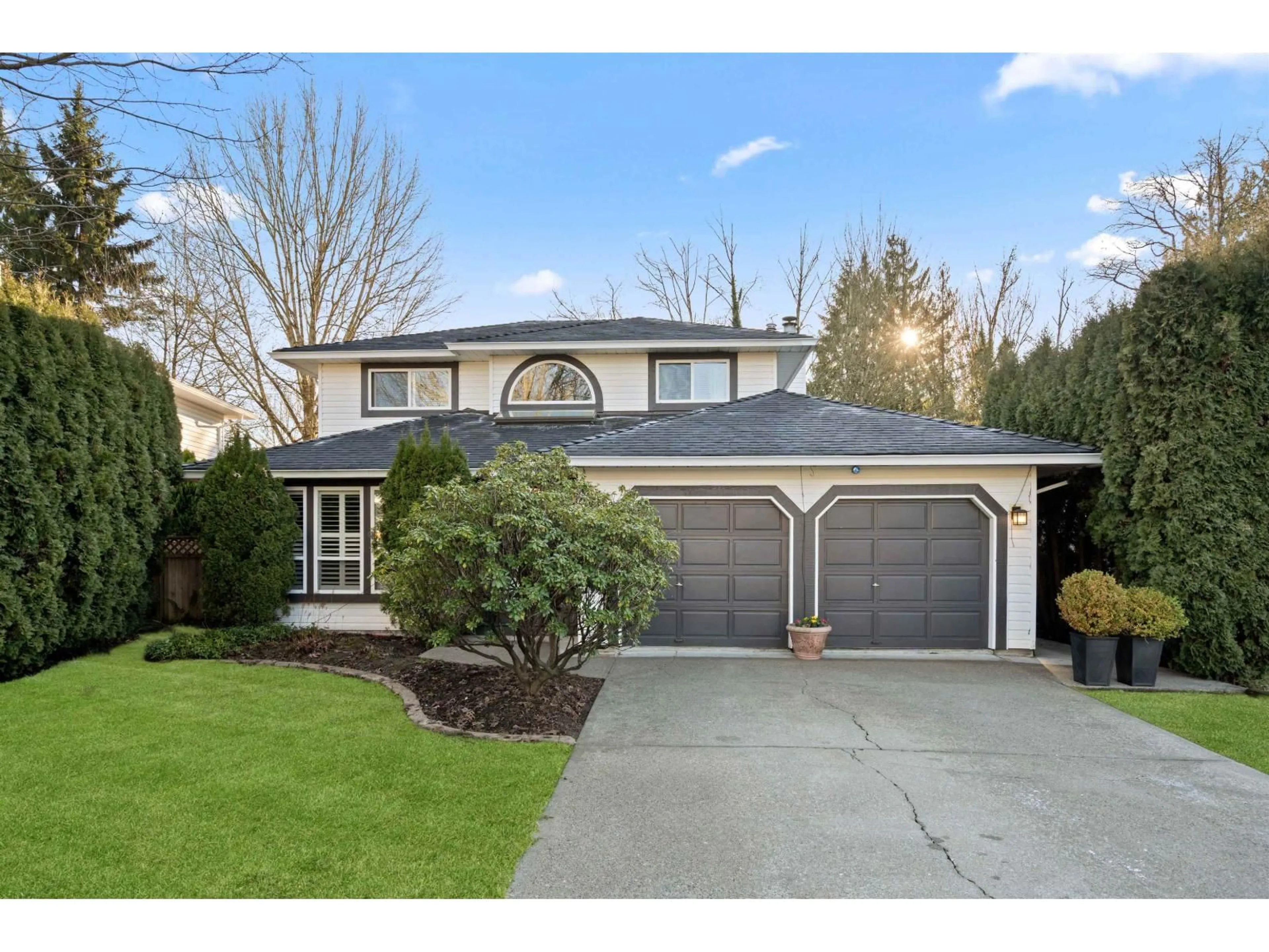 Home with vinyl exterior material, street for 21096 91A AVENUE, Langley British Columbia V1M2C4