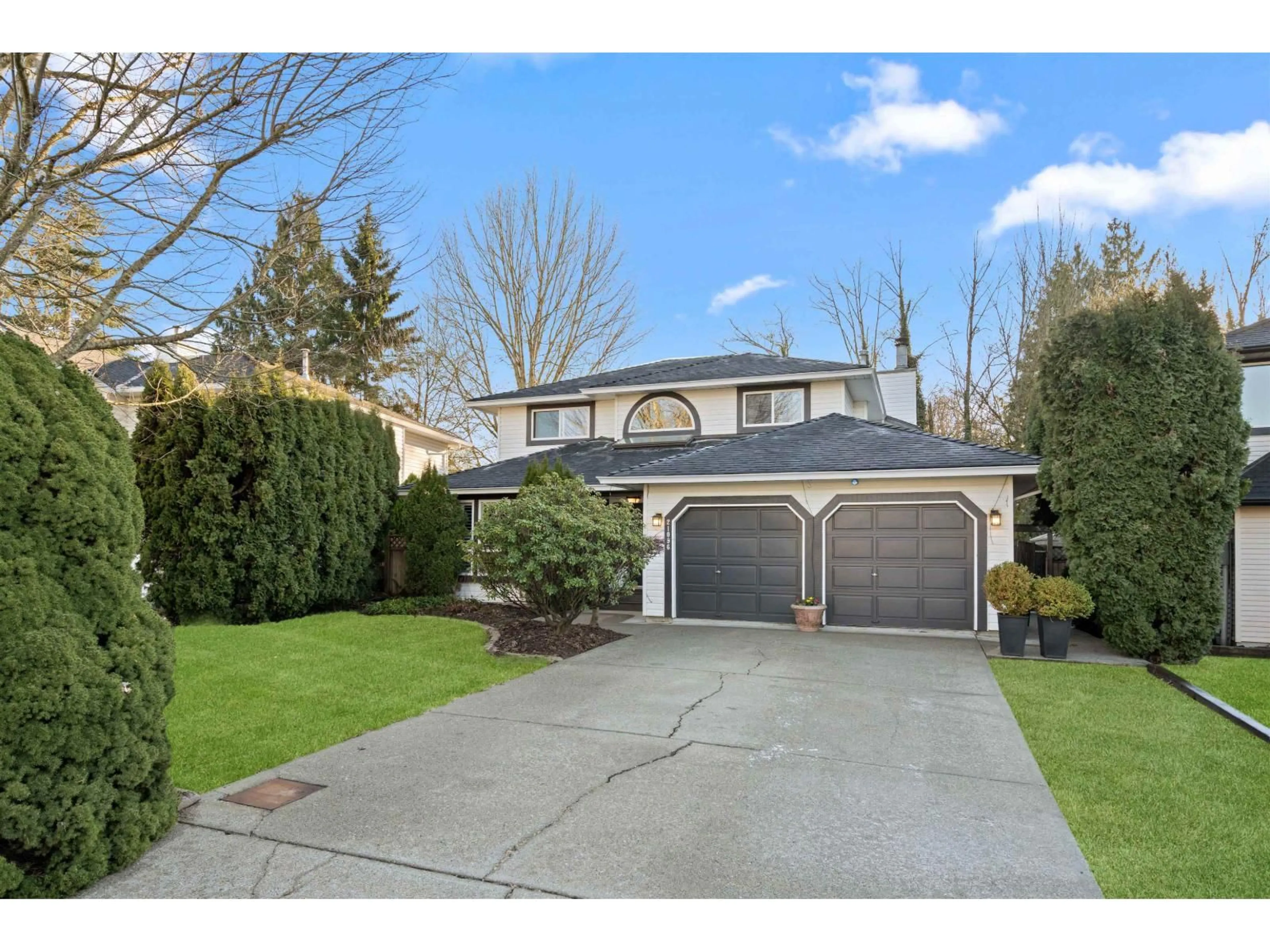 Home with vinyl exterior material, street for 21096 91A AVENUE, Langley British Columbia V1M2C4