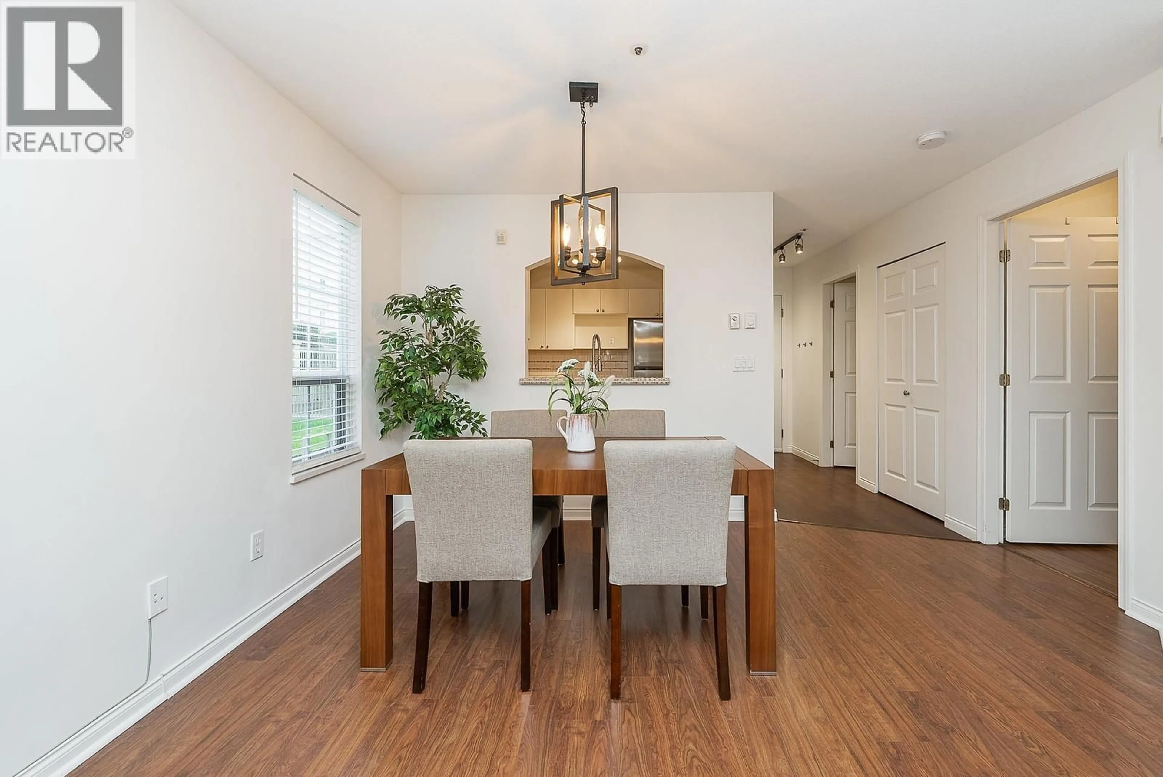 Dining room, wood/laminate floor for 101 - 2975 PRINCESS CRESCENT, Coquitlam British Columbia V3B7N3