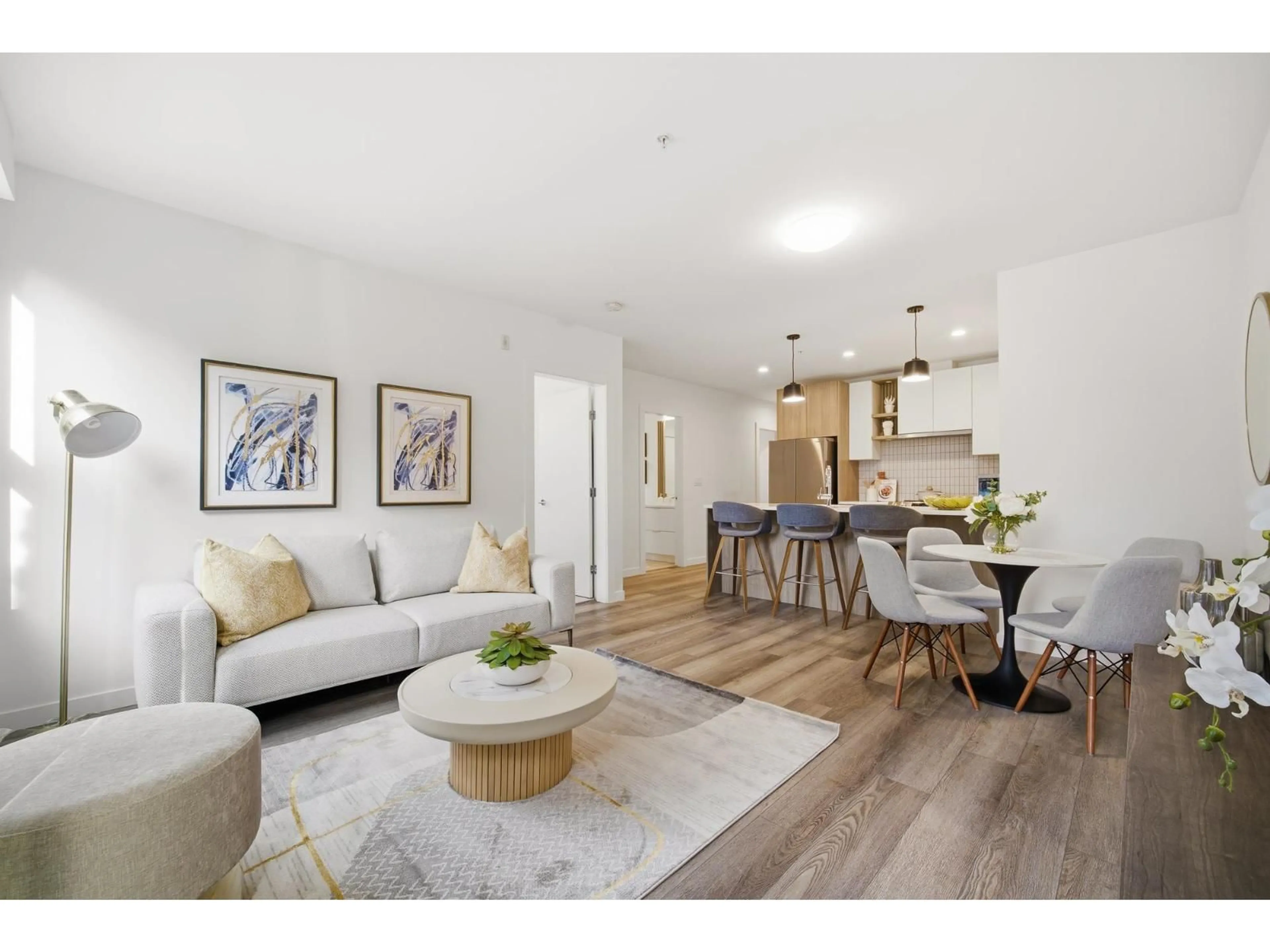 Living room with furniture, wood/laminate floor for 103 - 20695 EASTLEIGH CRESCENT, Langley British Columbia V3A0P7