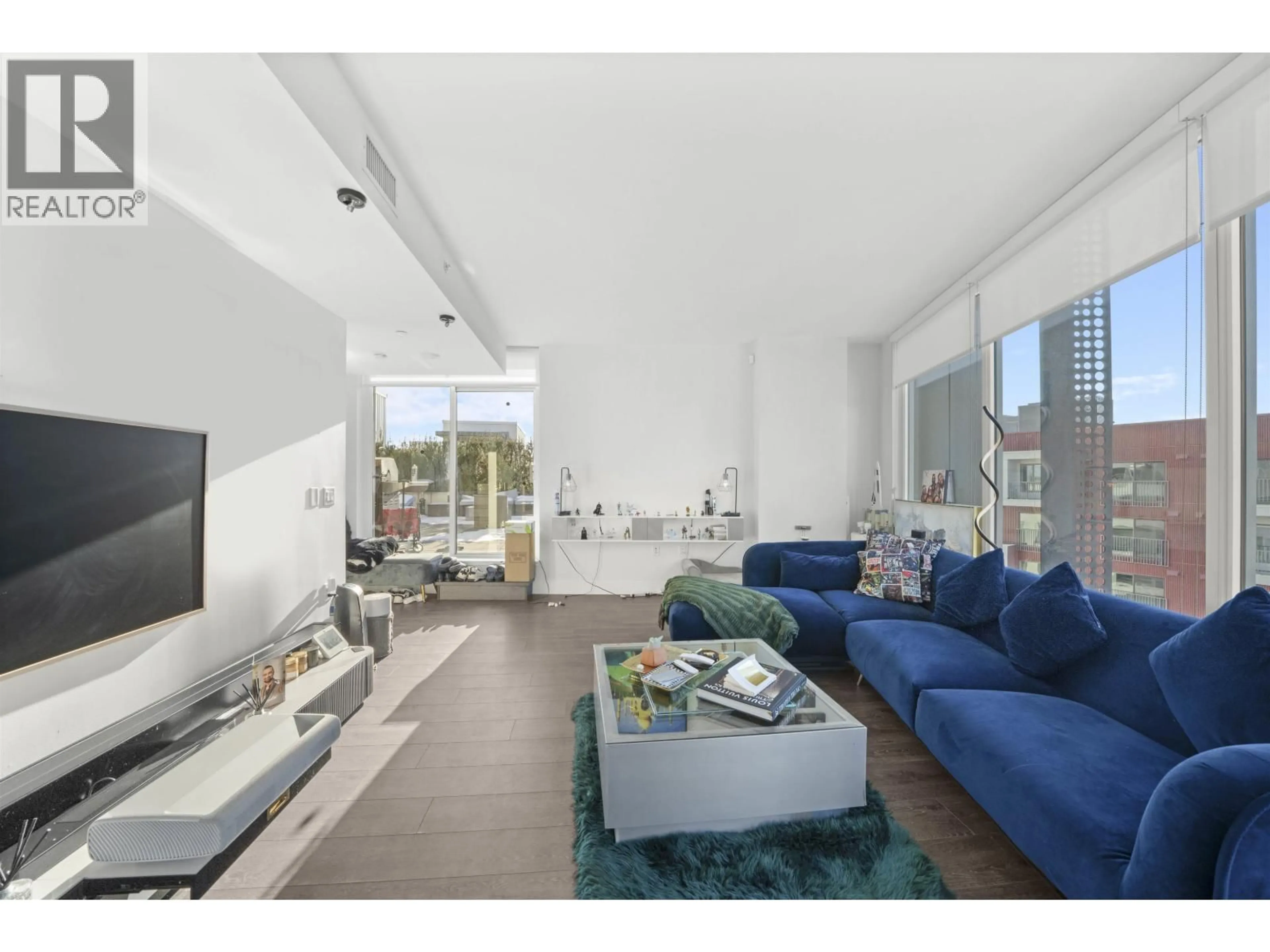 Living room with furniture, unknown for 609 - 3438 SAWMILL CRESCENT, Vancouver British Columbia V5S0E3