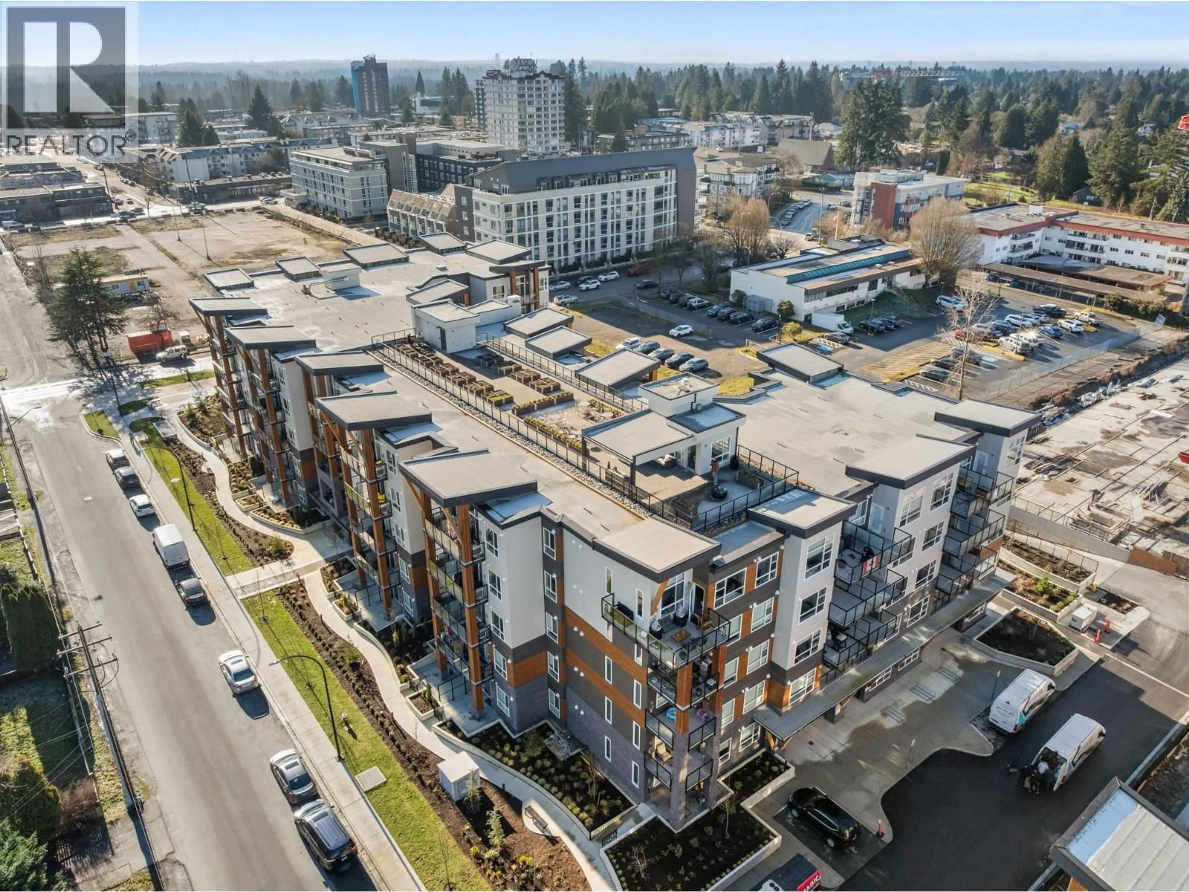 A pic from outside/outdoor area/front of a property/back of a property/a pic from drone, unknown for 402 - 12109 223 STREET, Maple Ridge British Columbia V2X5Y6