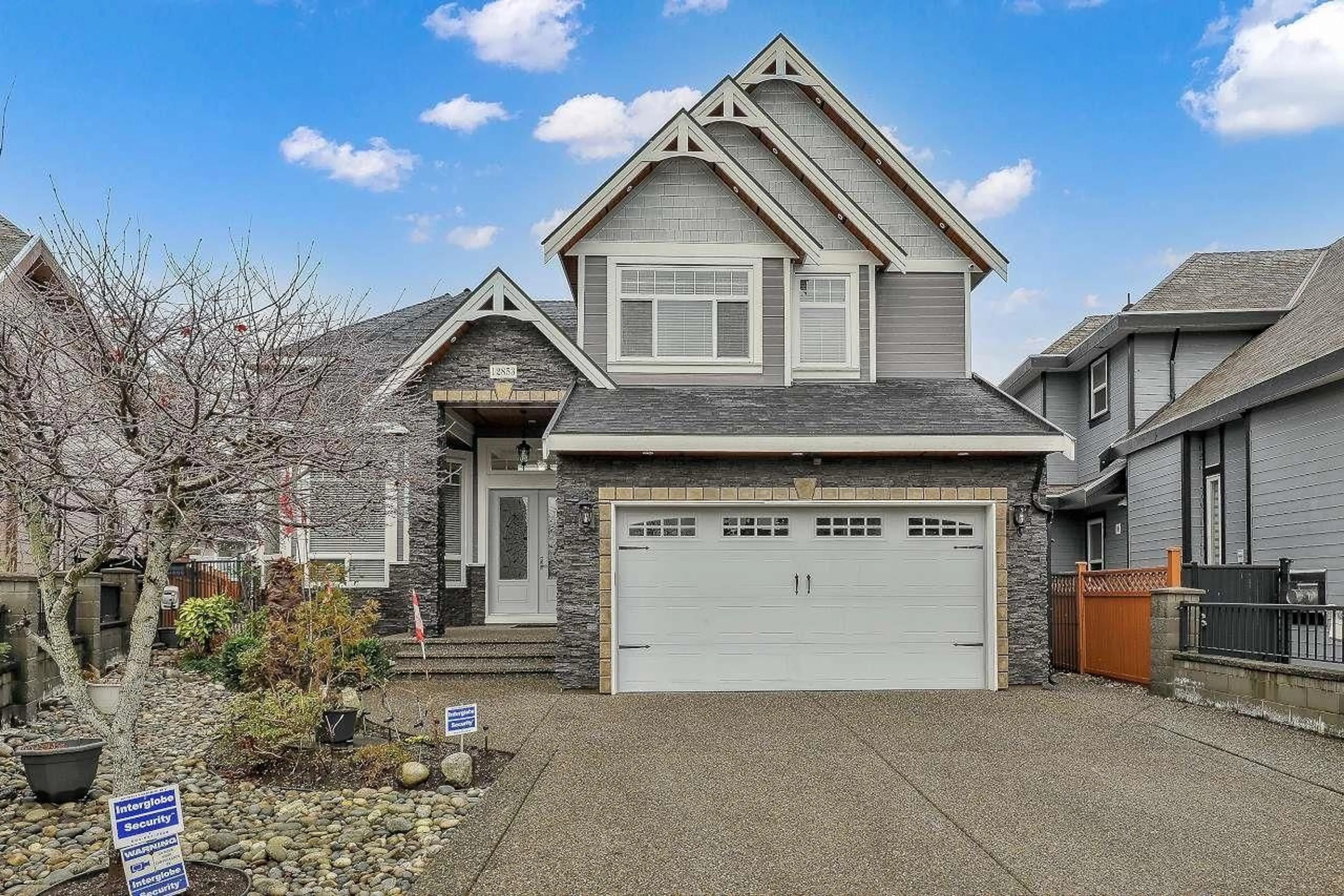 Home with vinyl exterior material, street for 12853 63A AVENUE, Surrey British Columbia V3X1S4