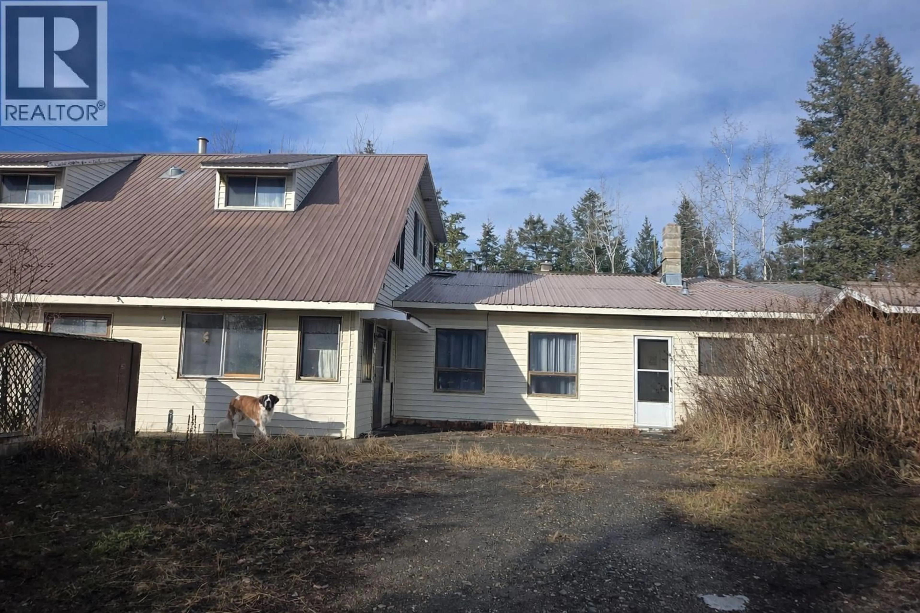 A pic from outside/outdoor area/front of a property/back of a property/a pic from drone, building for 3797 DODGE ROAD, Lac La Hache British Columbia V0K1T1