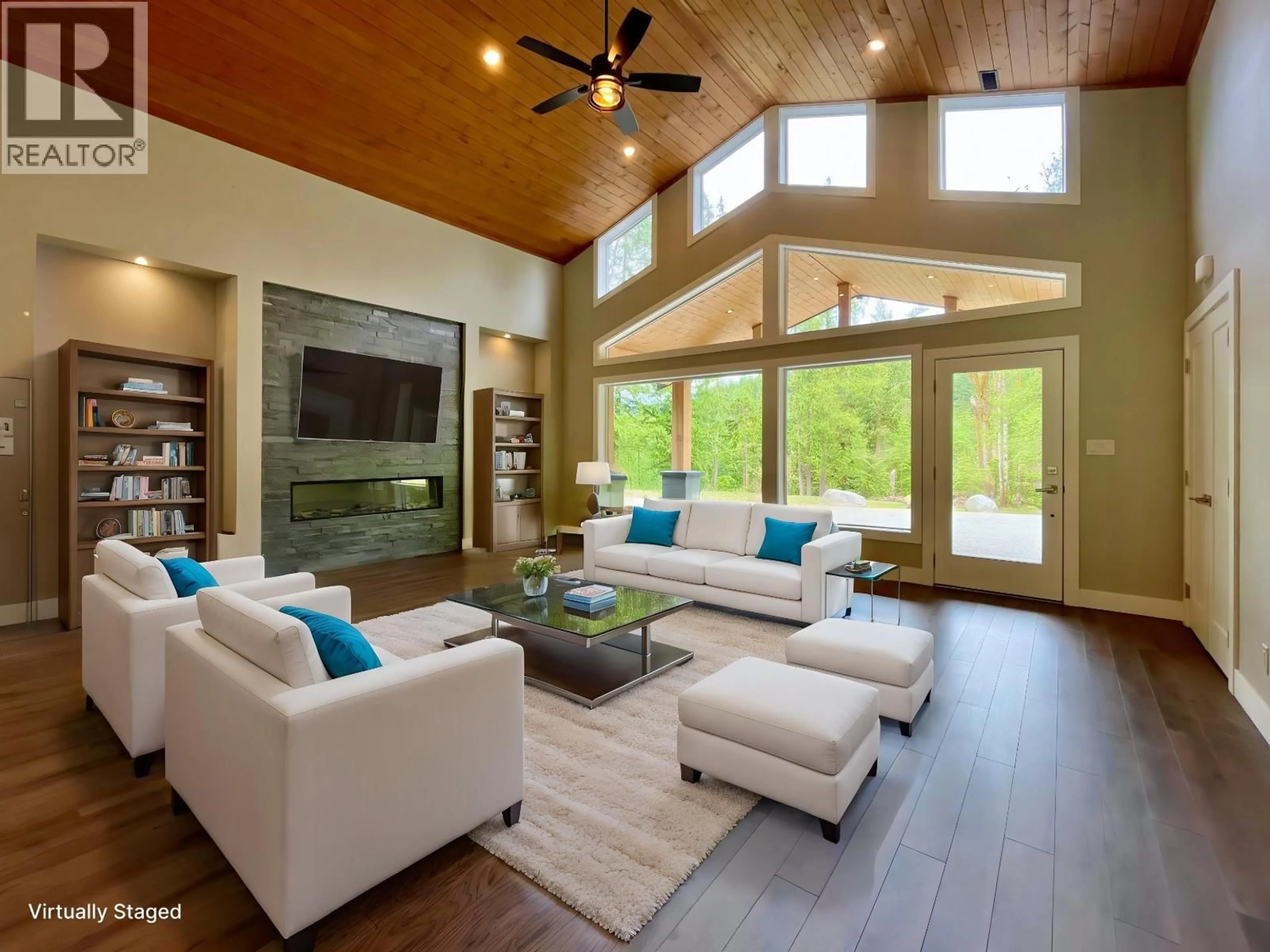 Living room with furniture, wood/laminate floor for 2061 TWIN CREEKS ROAD, Langdale British Columbia V0N1V6