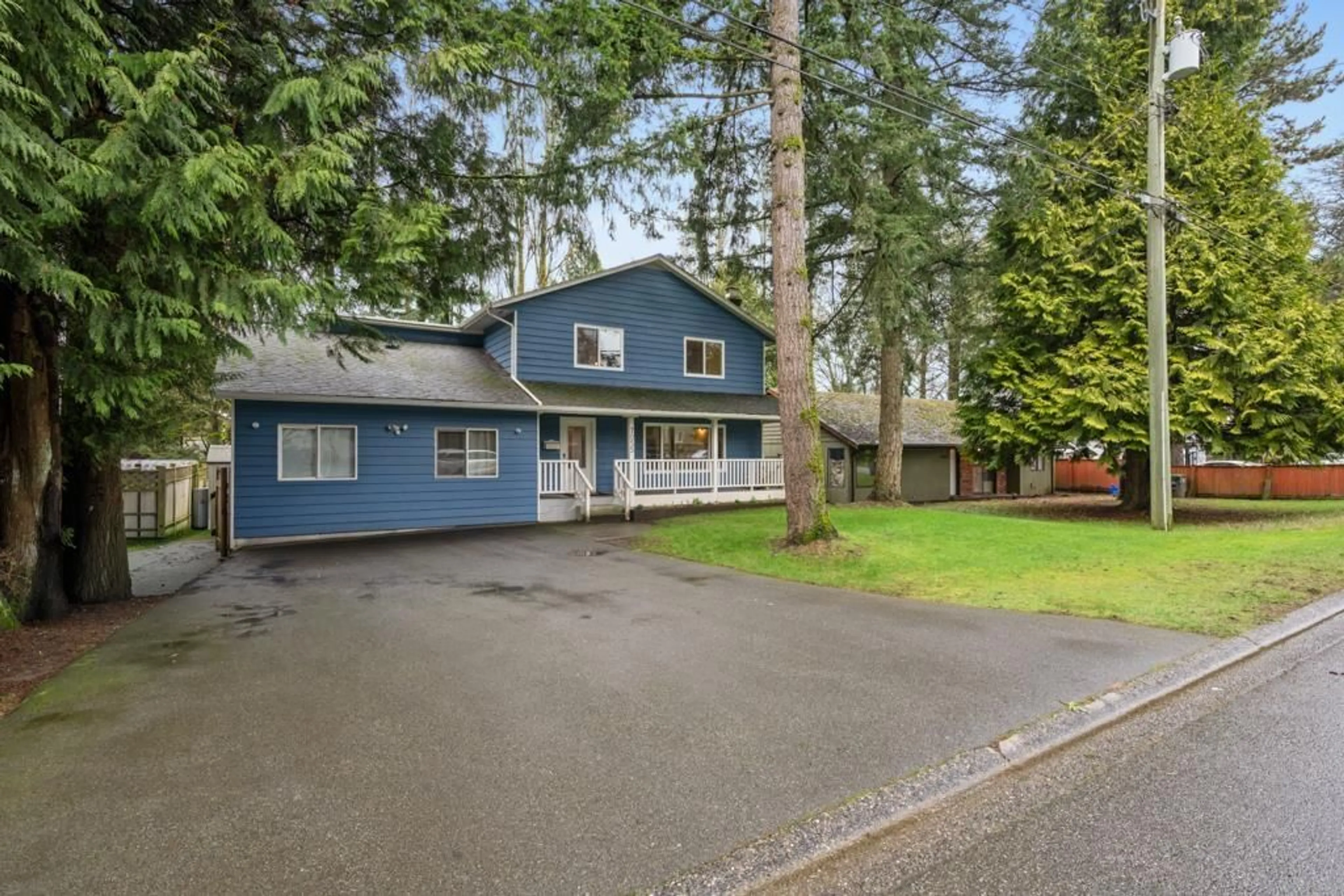 Home with vinyl exterior material, street for 7055 140A STREET, Surrey British Columbia V3W5L4