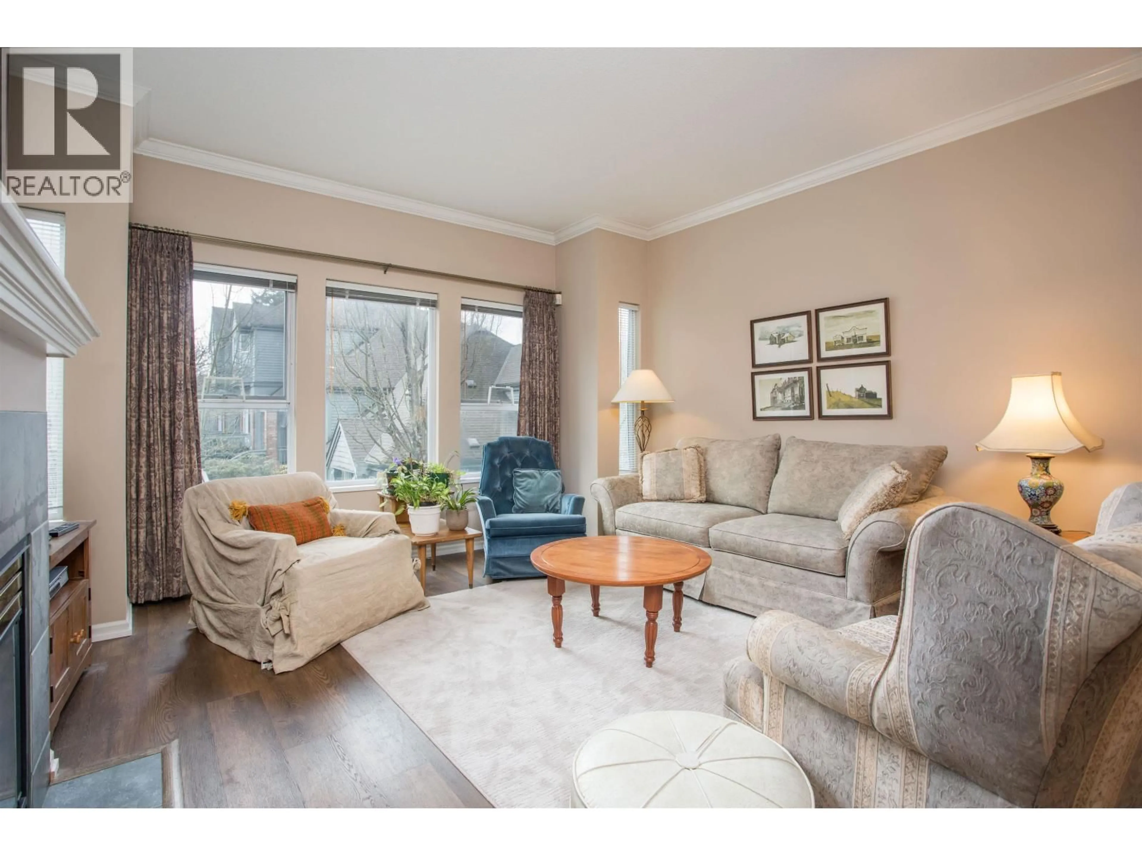 Living room with furniture, wood/laminate floor for 26 - 5820 DOVER CRESCENT, Richmond British Columbia V7C5P3