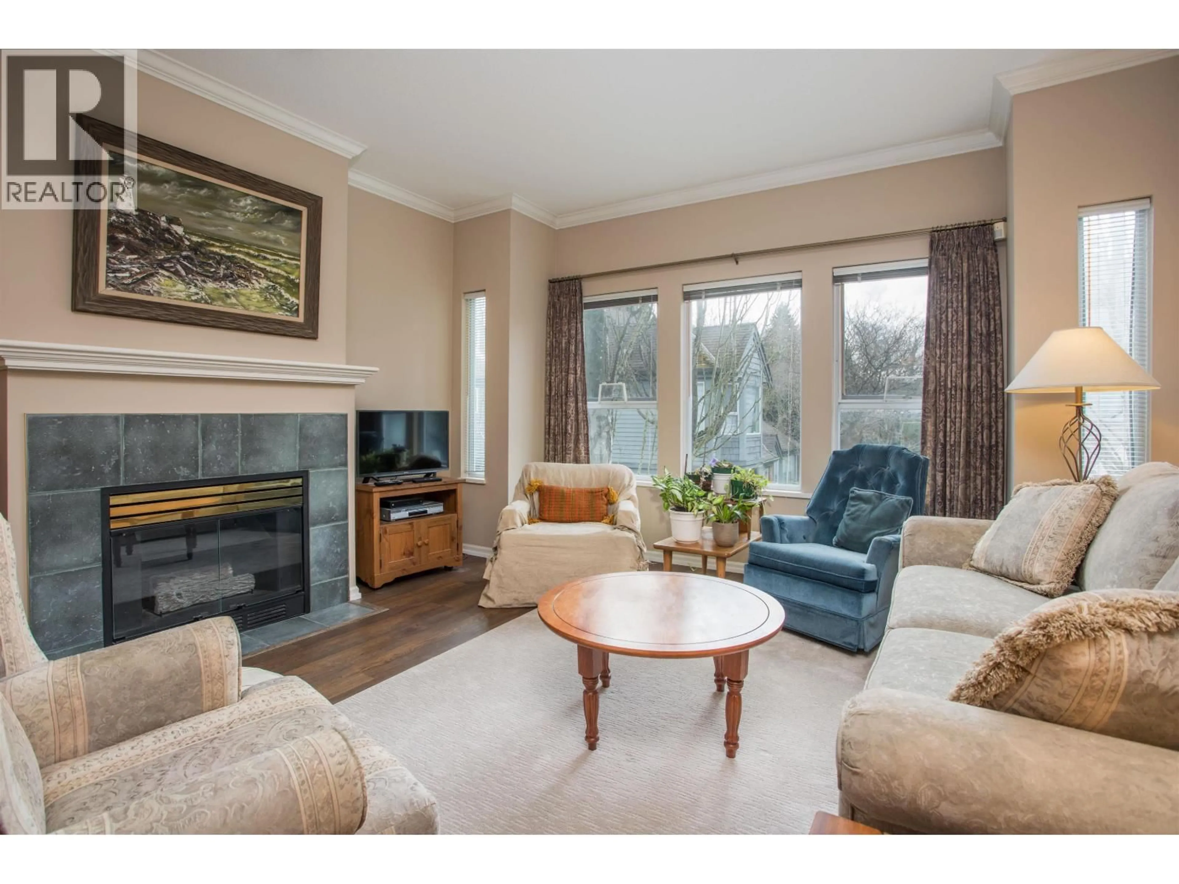 Living room with furniture, wood/laminate floor for 26 - 5820 DOVER CRESCENT, Richmond British Columbia V7C5P3