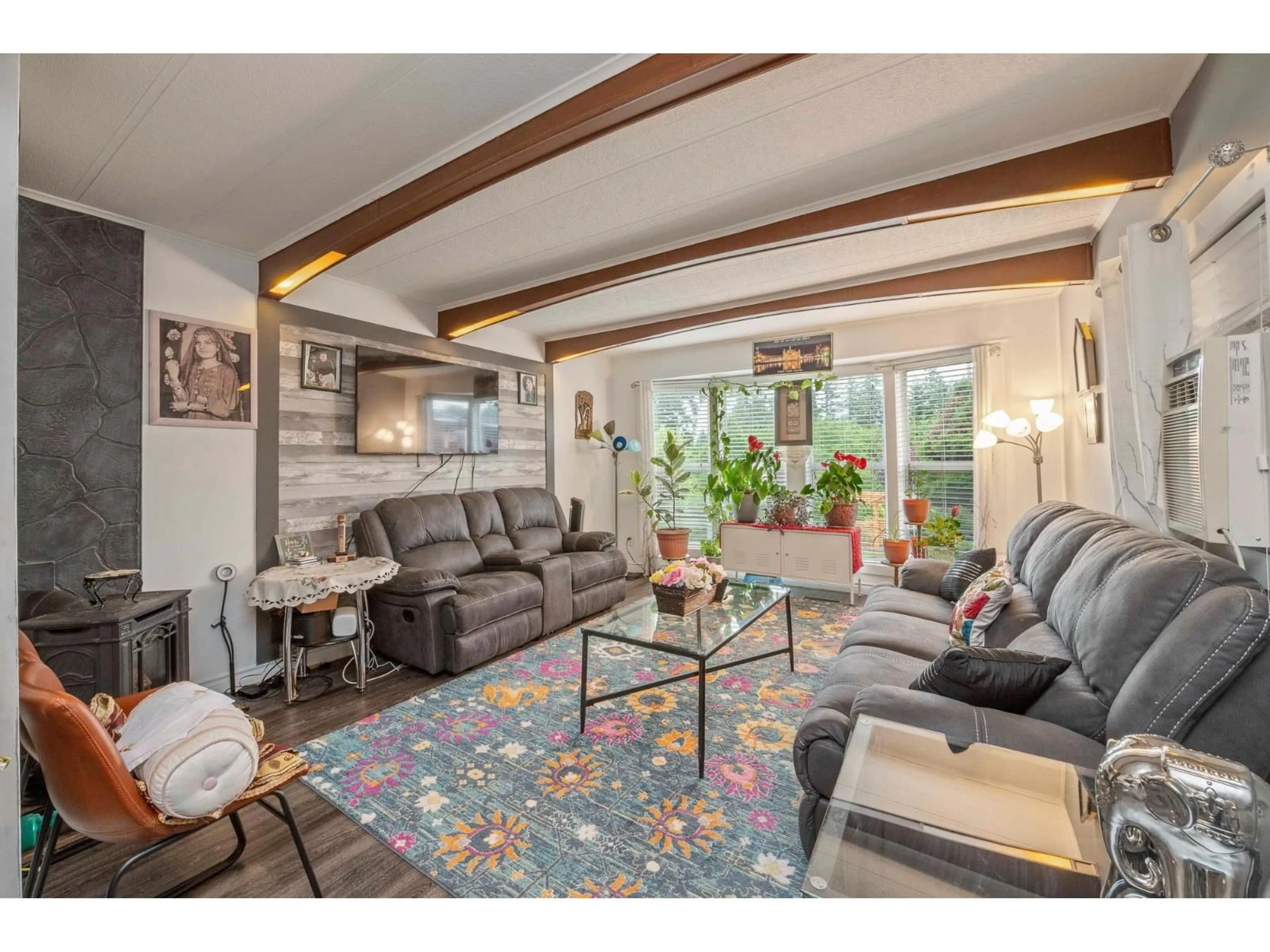 Living room with furniture, wood/laminate floor for 13 - 27111 0 AVENUE, Langley British Columbia V4W2S9