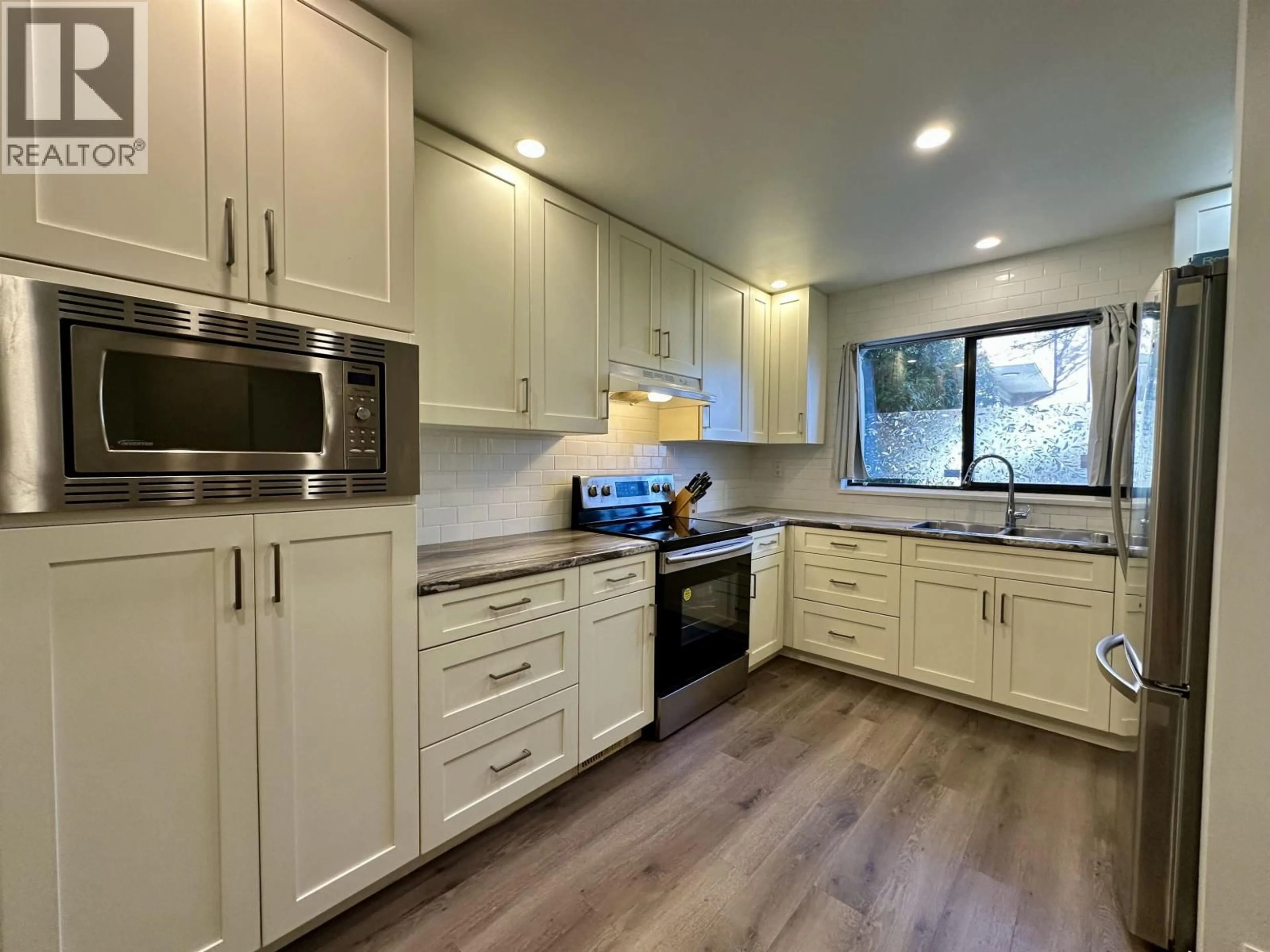 Open concept kitchen, unknown for 106 - 511 GATENSBURY STREET, Coquitlam British Columbia V3J5E7