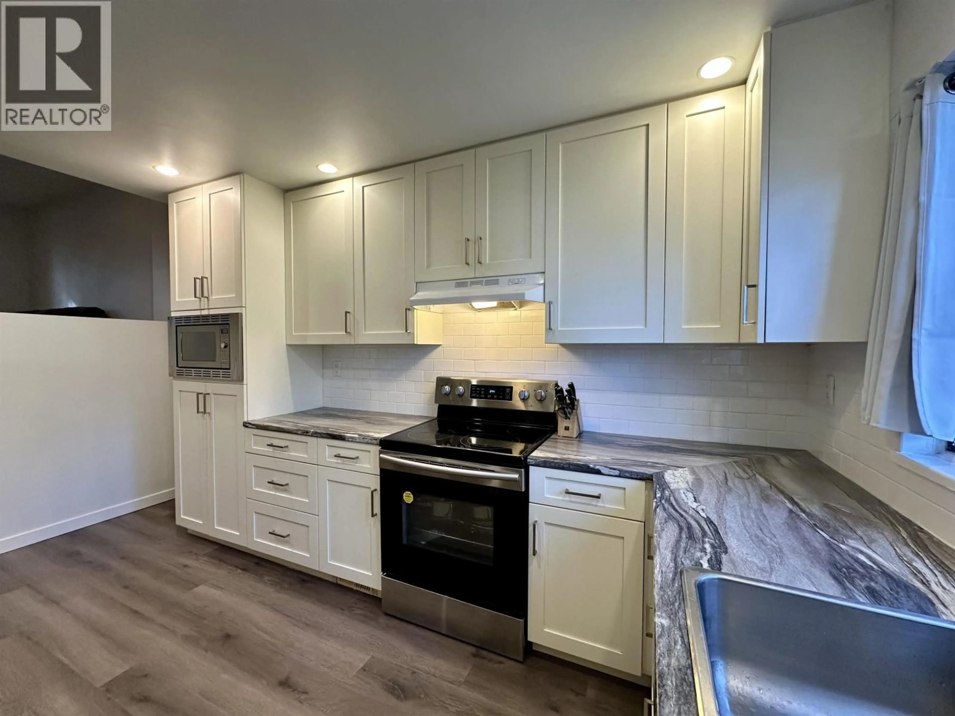 Open concept kitchen, unknown for 106 - 511 GATENSBURY STREET, Coquitlam British Columbia V3J5E7