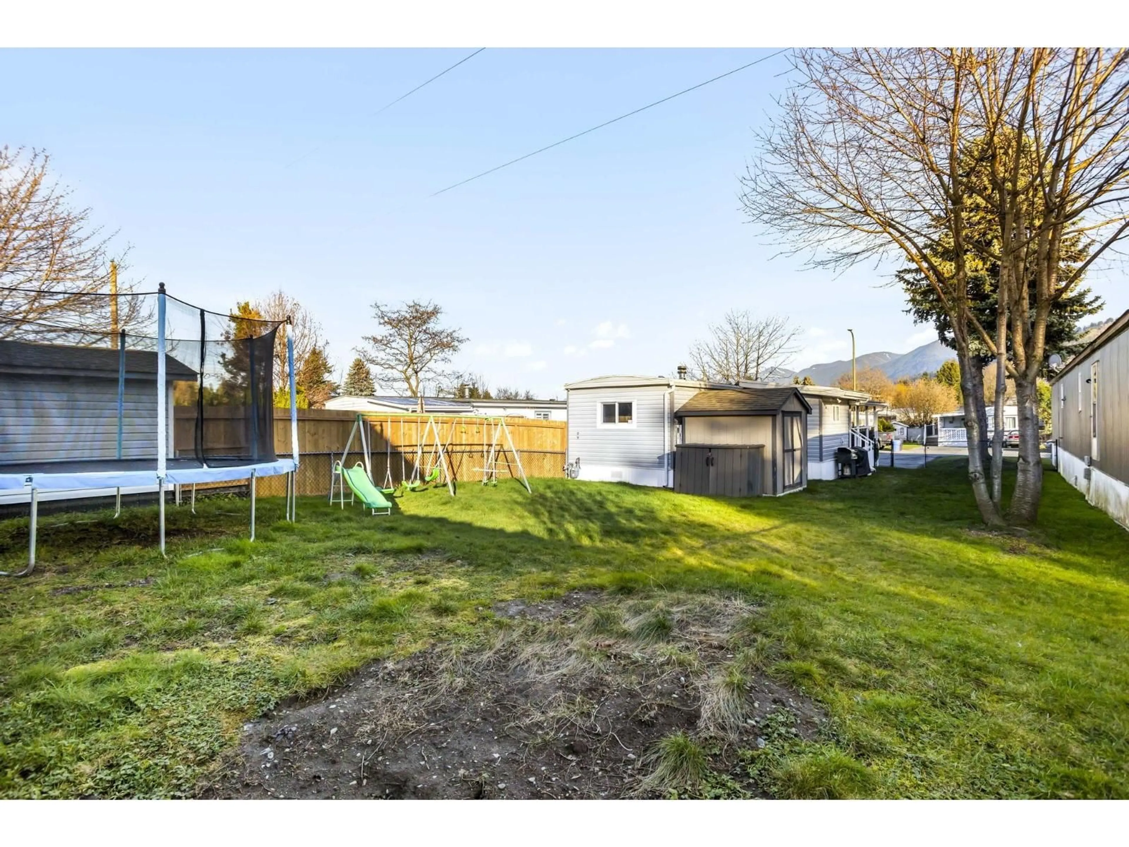 A pic from outside/outdoor area/front of a property/back of a property/a pic from drone, street for 20 - 45640 WATSON ROAD, Chilliwack British Columbia V2R3P9