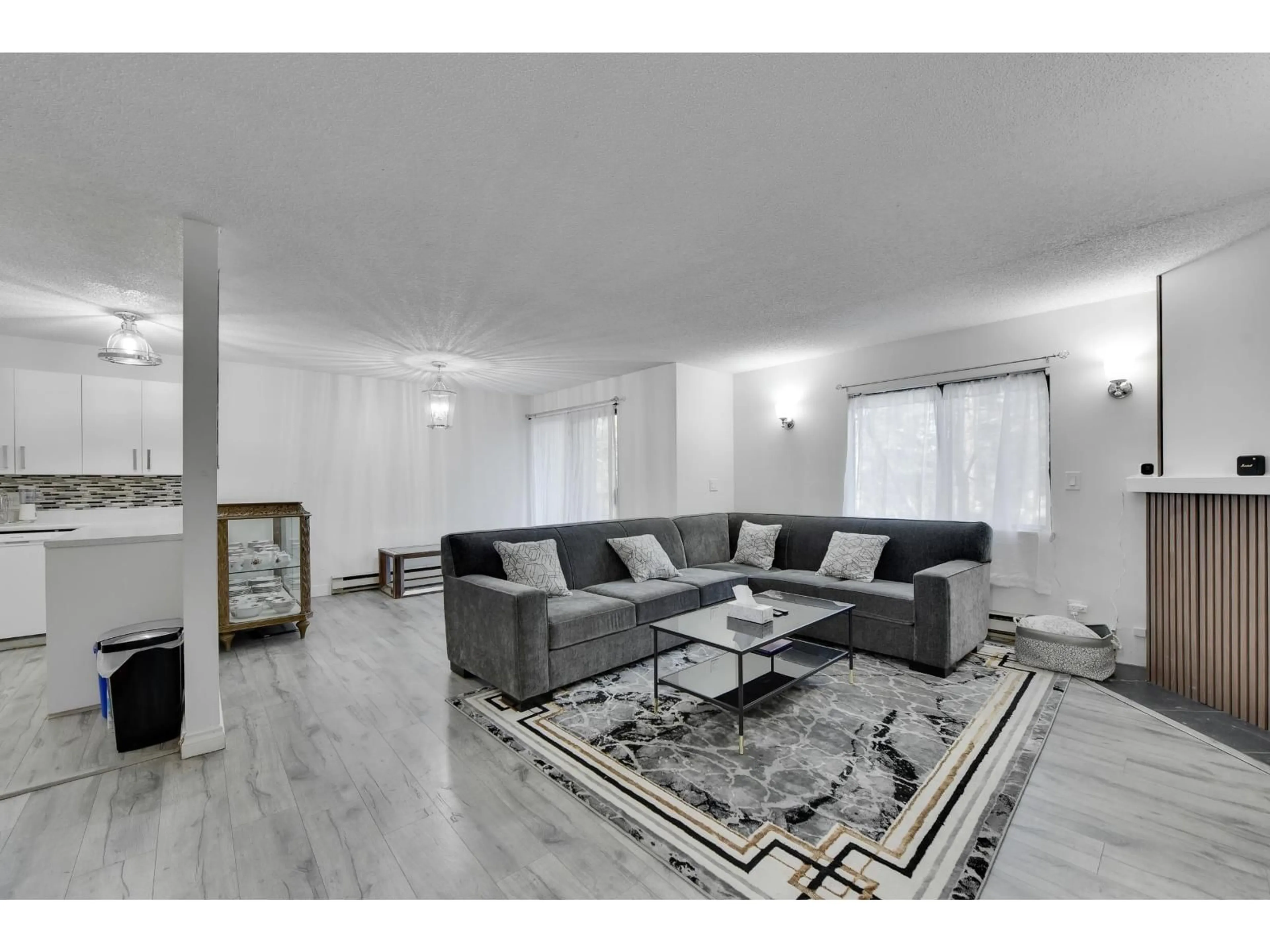 Living room with furniture, unknown for 203 - 7064 133B STREET, Surrey British Columbia V3W8A4