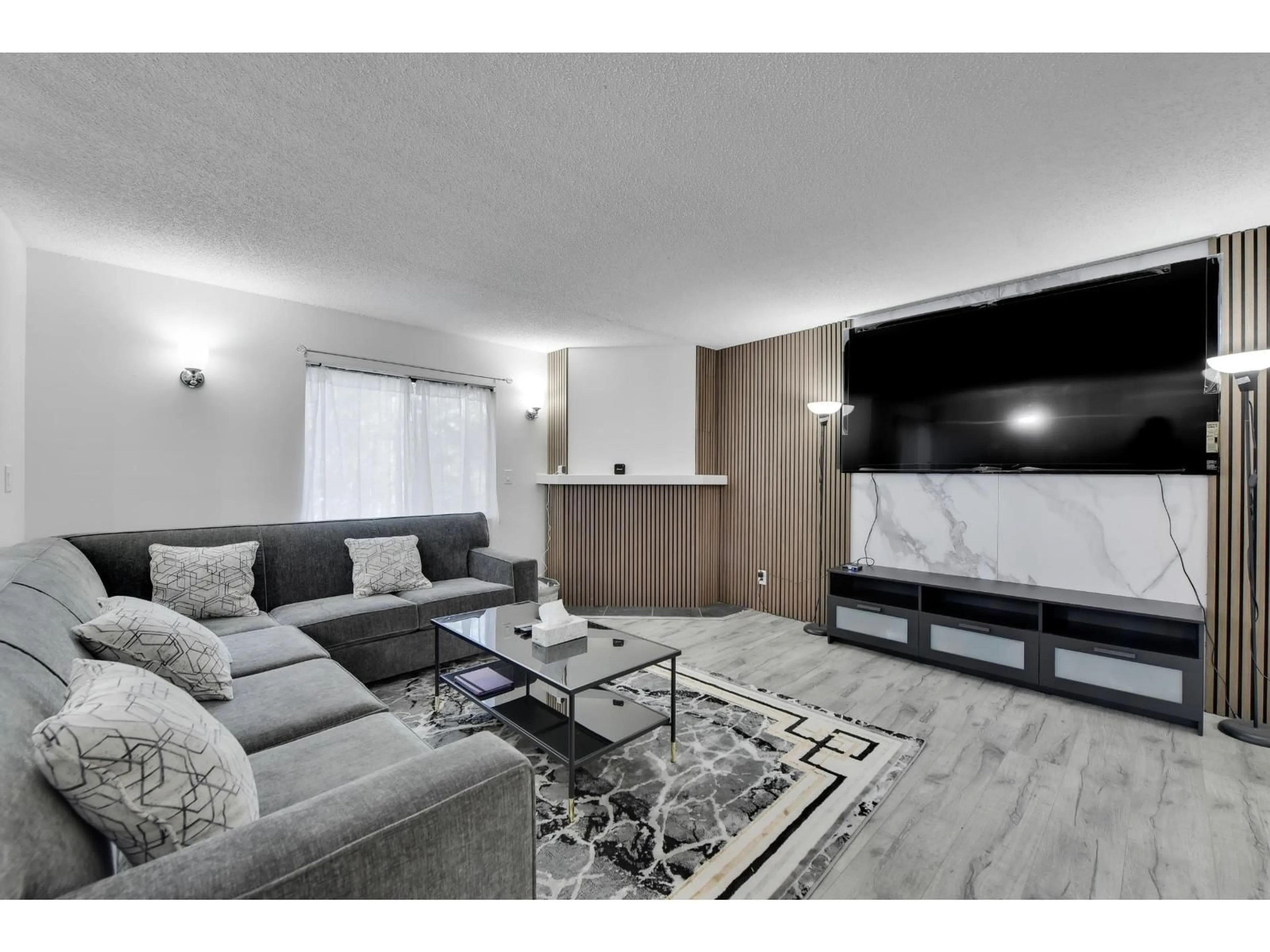 Living room with furniture, unknown for 203 - 7064 133B STREET, Surrey British Columbia V3W8A4