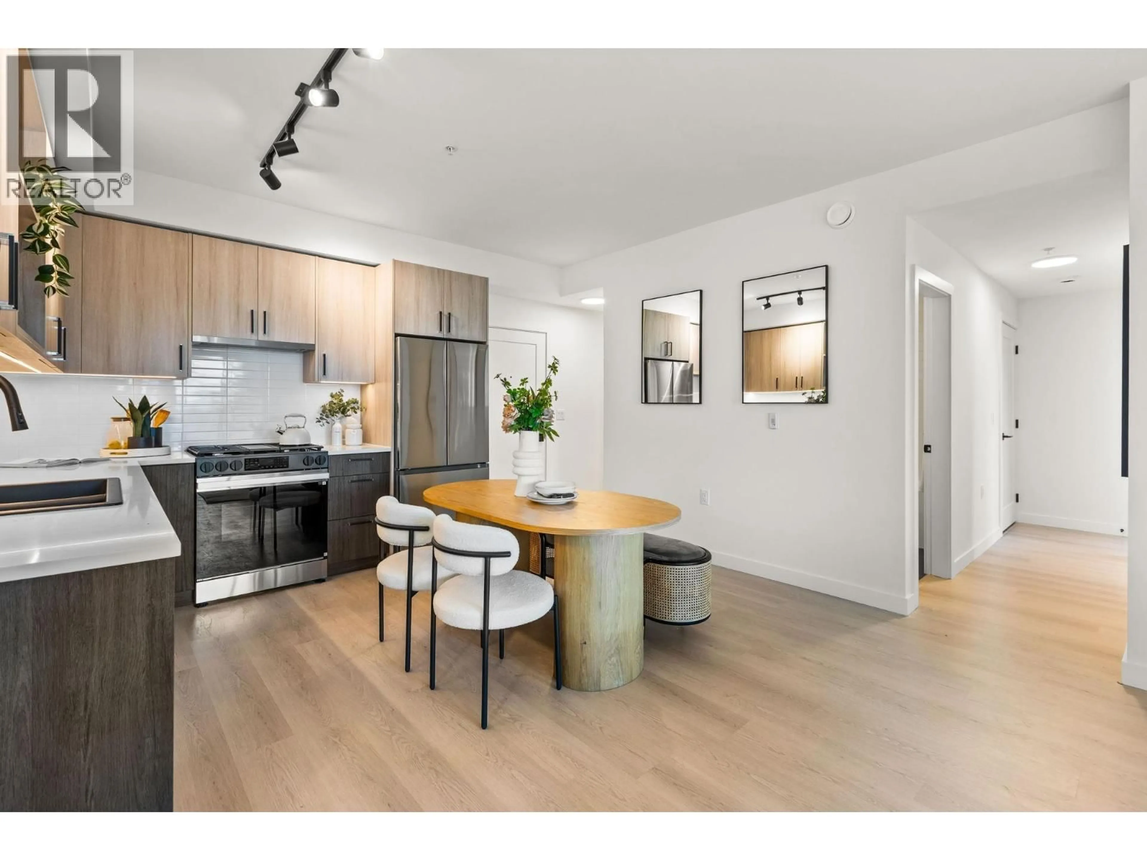 Open concept kitchen, wood/laminate floor for 407 - 2002 ST. GEORGE STREET, Port Moody British Columbia V3H0N4