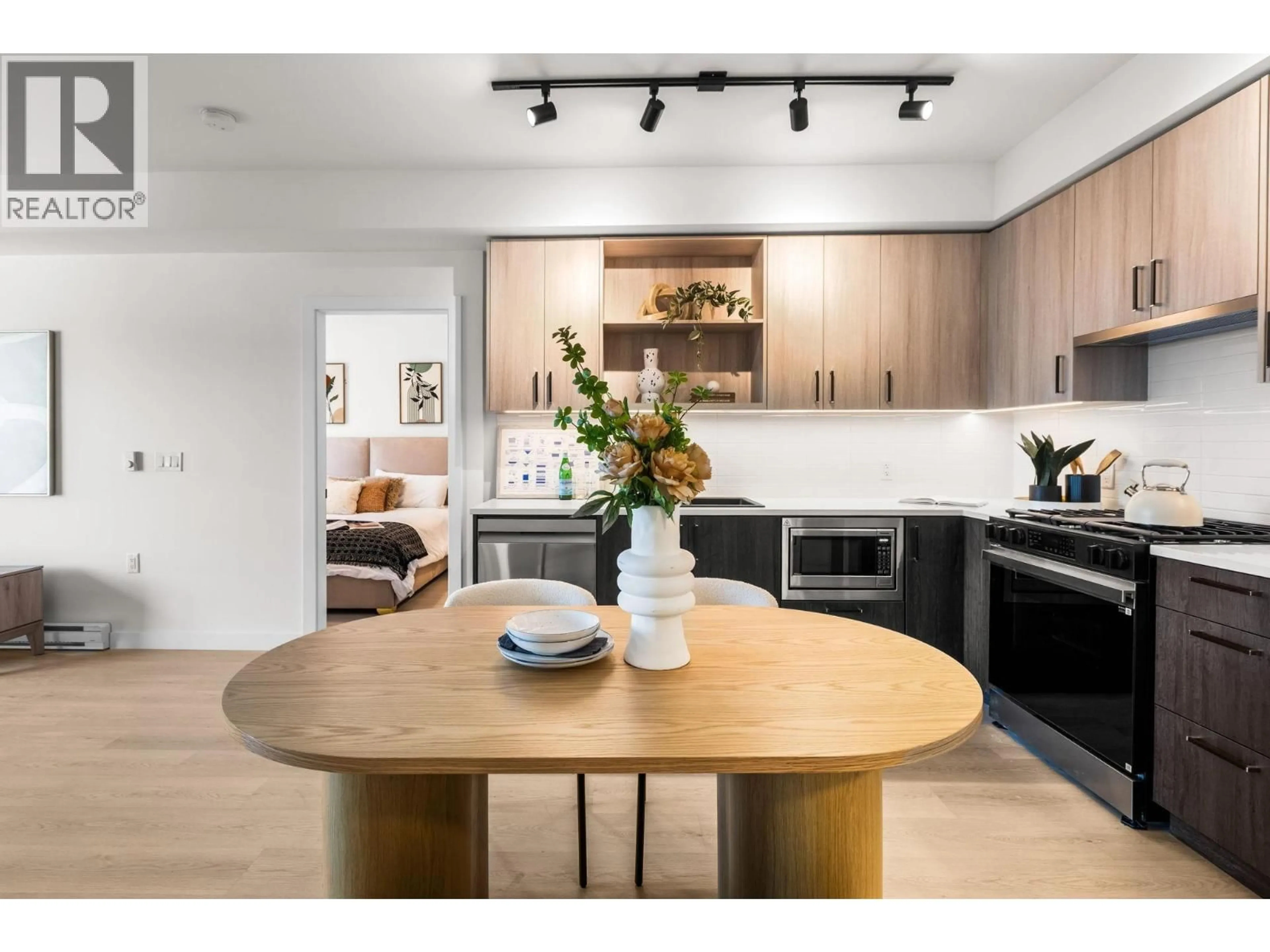 Open concept kitchen, wood/laminate floor for 407 - 2002 ST. GEORGE STREET, Port Moody British Columbia V3H0N4