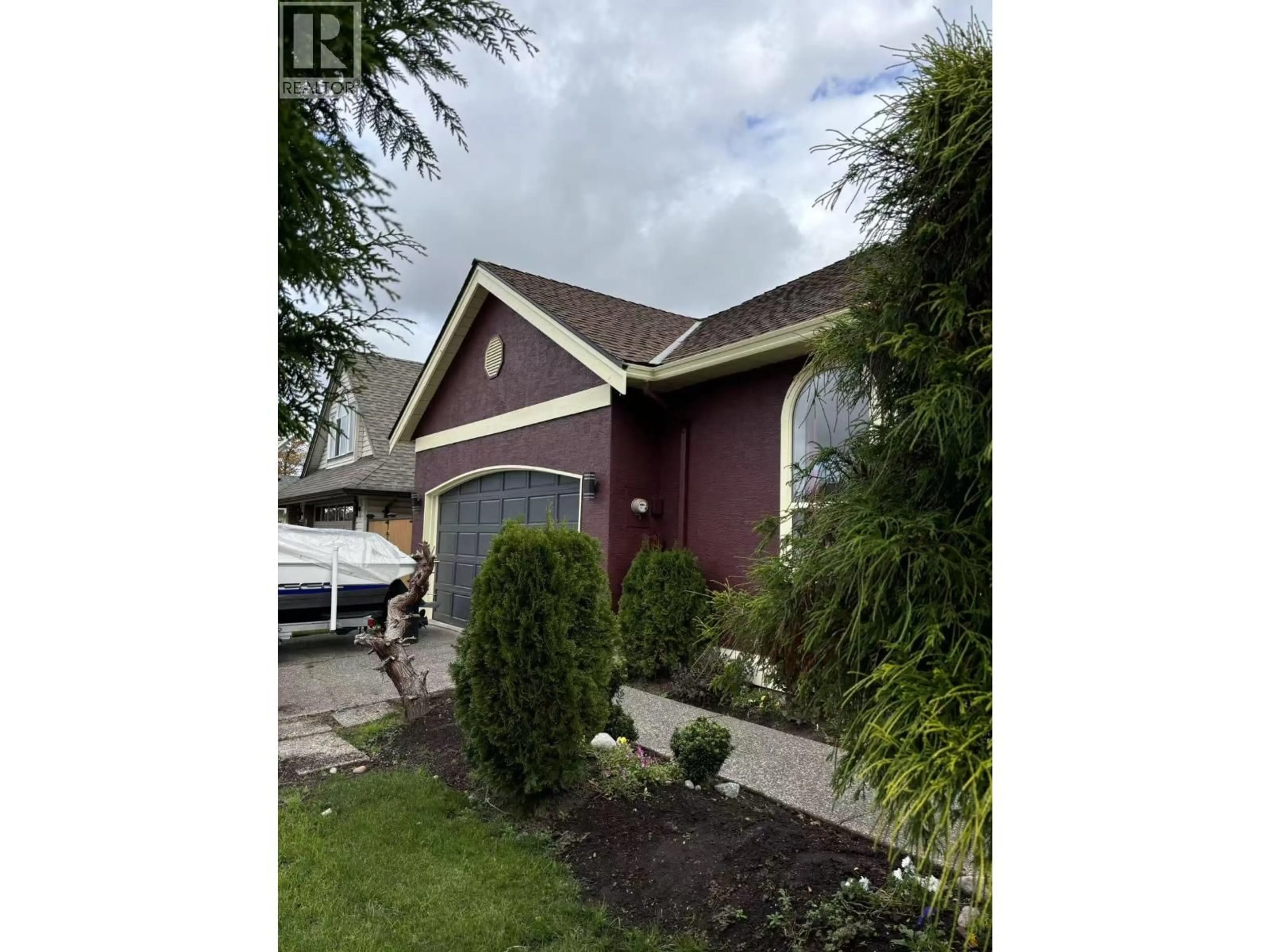 Home with vinyl exterior material, street for 1658 GOLF CLUB DRIVE, Delta British Columbia V4M4E2