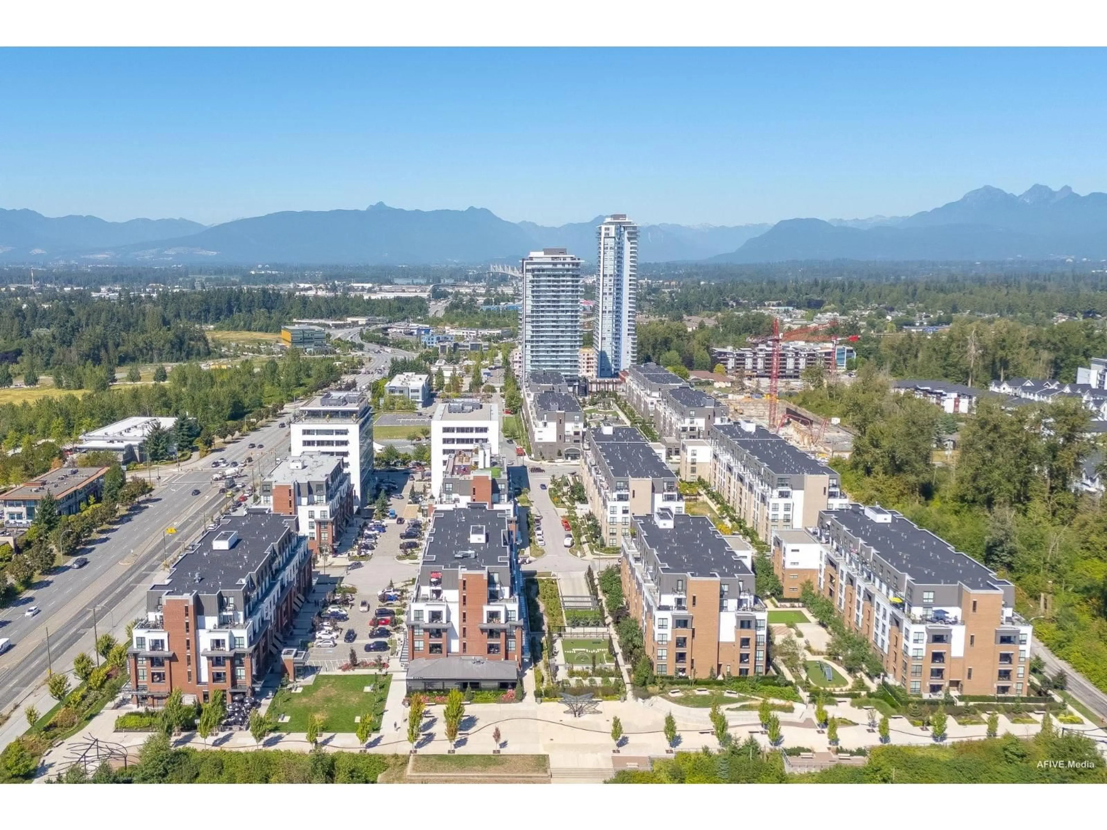 A pic from outside/outdoor area/front of a property/back of a property/a pic from drone, mountain view for B601 - 20018 83A AVENUE, Langley British Columbia V2Y3P3