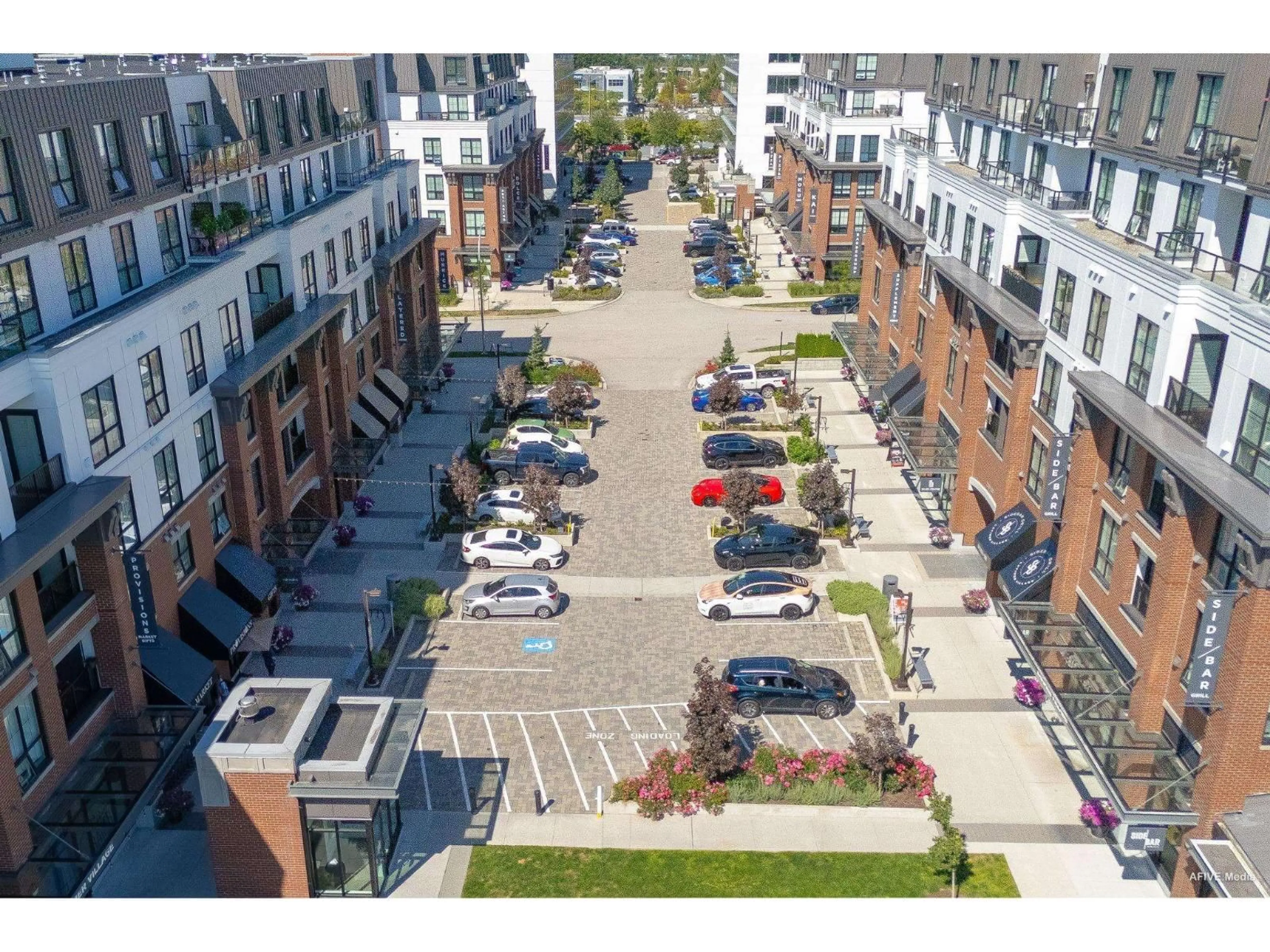 A pic from outside/outdoor area/front of a property/back of a property/a pic from drone, street for B601 - 20018 83A AVENUE, Langley British Columbia V2Y3P3