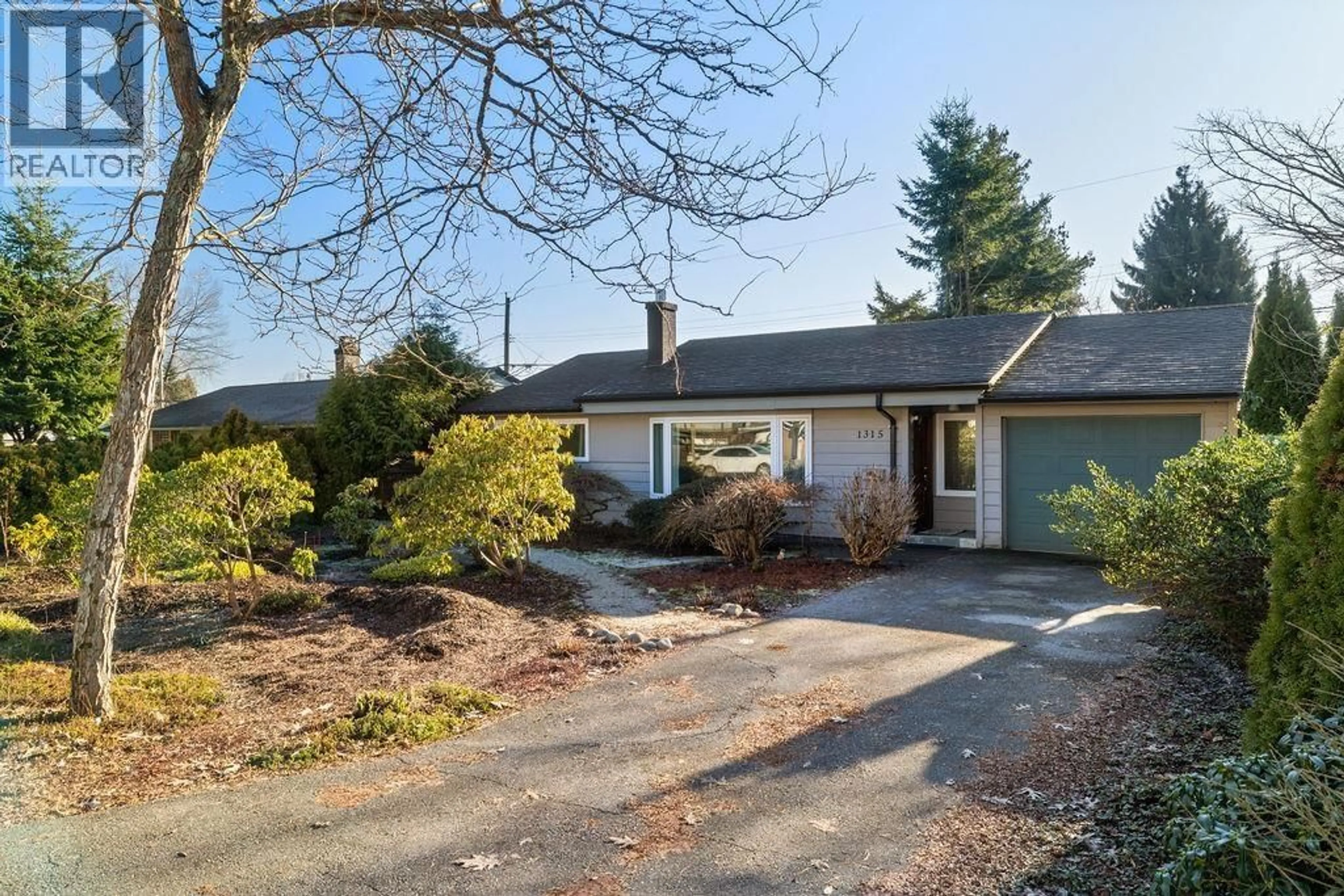 A pic from outside/outdoor area/front of a property/back of a property/a pic from drone, street for 1315 15TH STREET, North Vancouver British Columbia V7P1N1