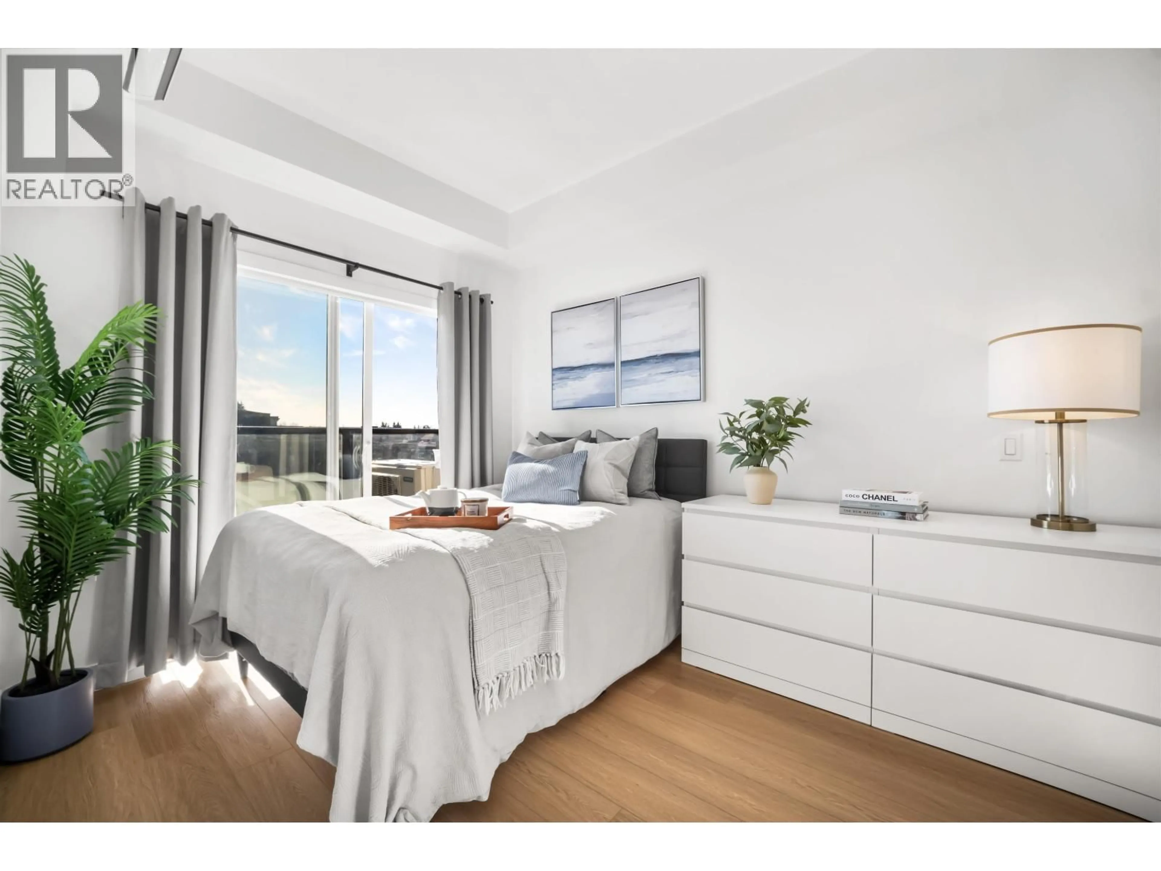 Bedroom with bed, wood/laminate floor for 404 - 2331 KELLY AVENUE, Port Coquitlam British Columbia V3C0T4