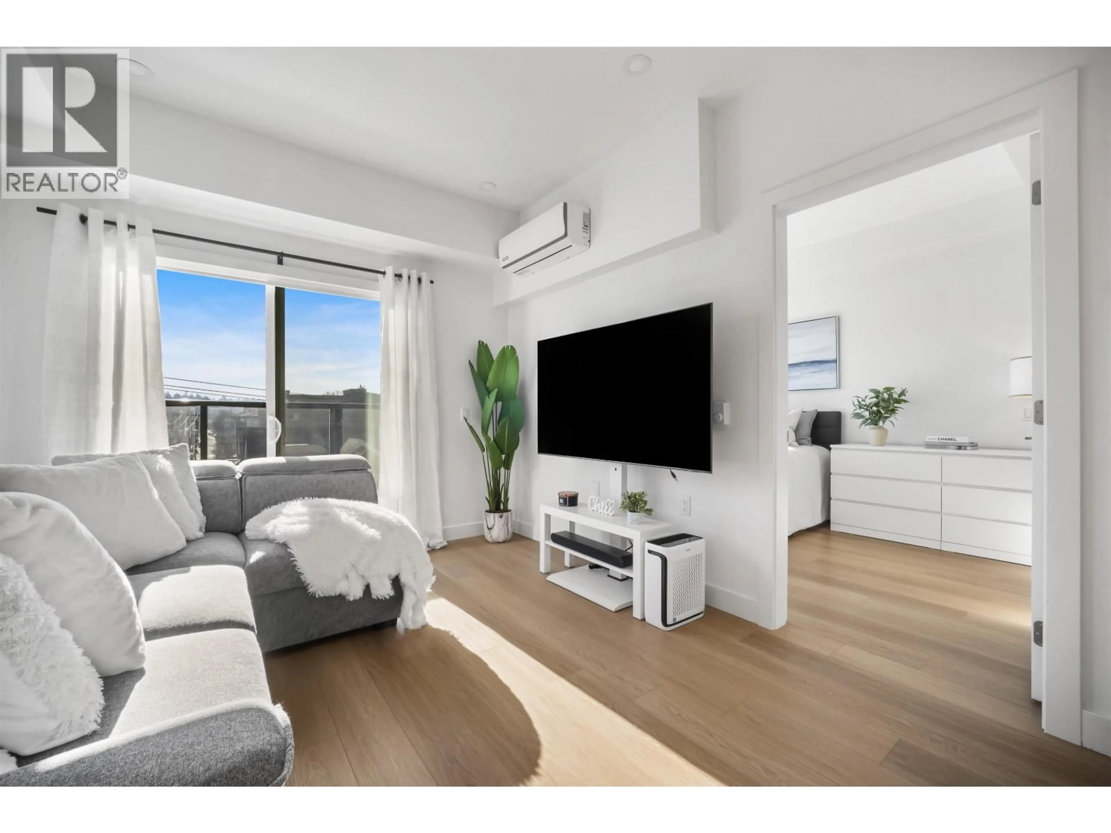 Living room with furniture, unknown for 404 - 2331 KELLY AVENUE, Port Coquitlam British Columbia V3C0T4