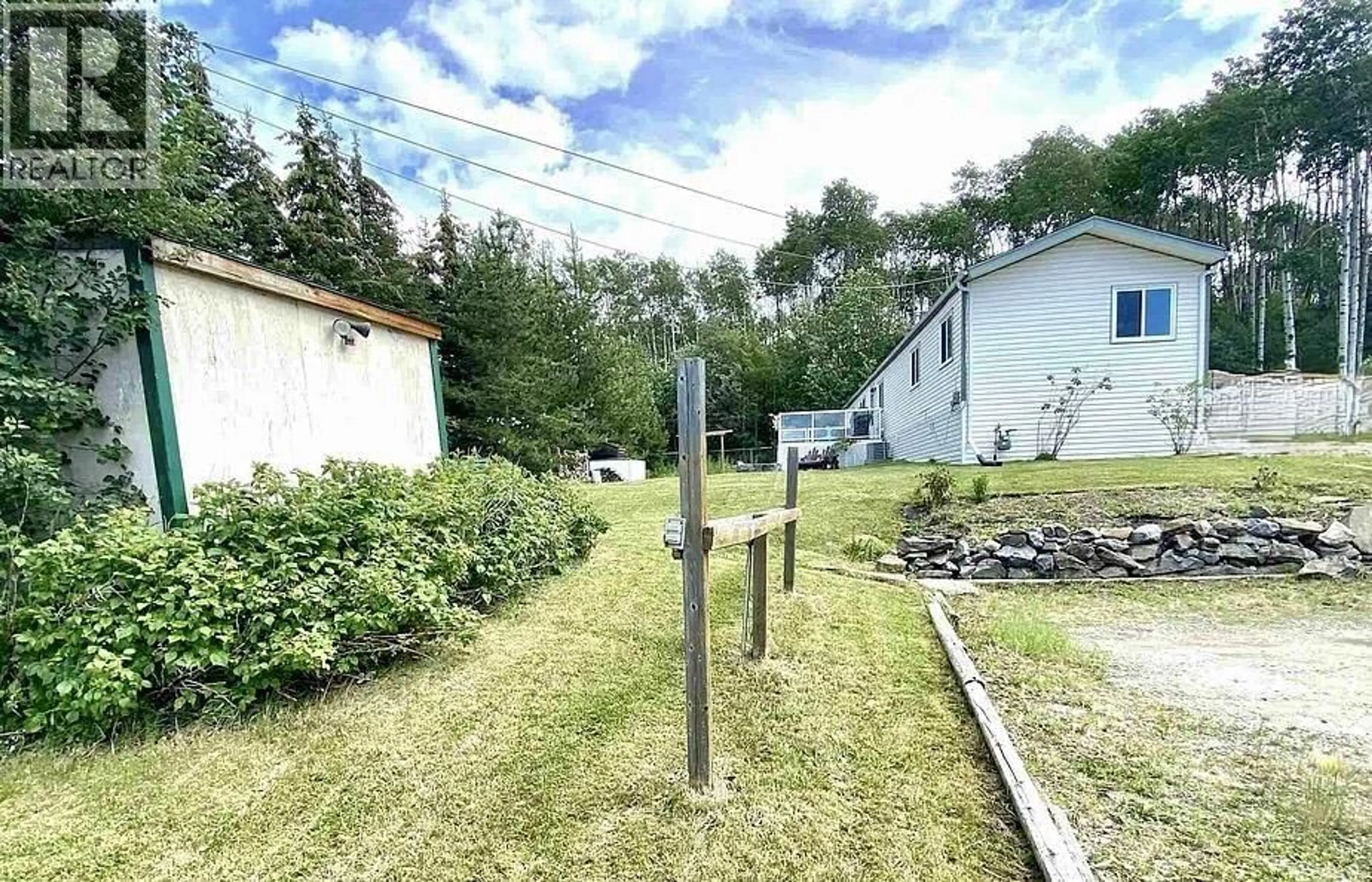 A pic from outside/outdoor area/front of a property/back of a property/a pic from drone, street for 13214 PARADISE STREET, Fort St. John British Columbia V0C1H0