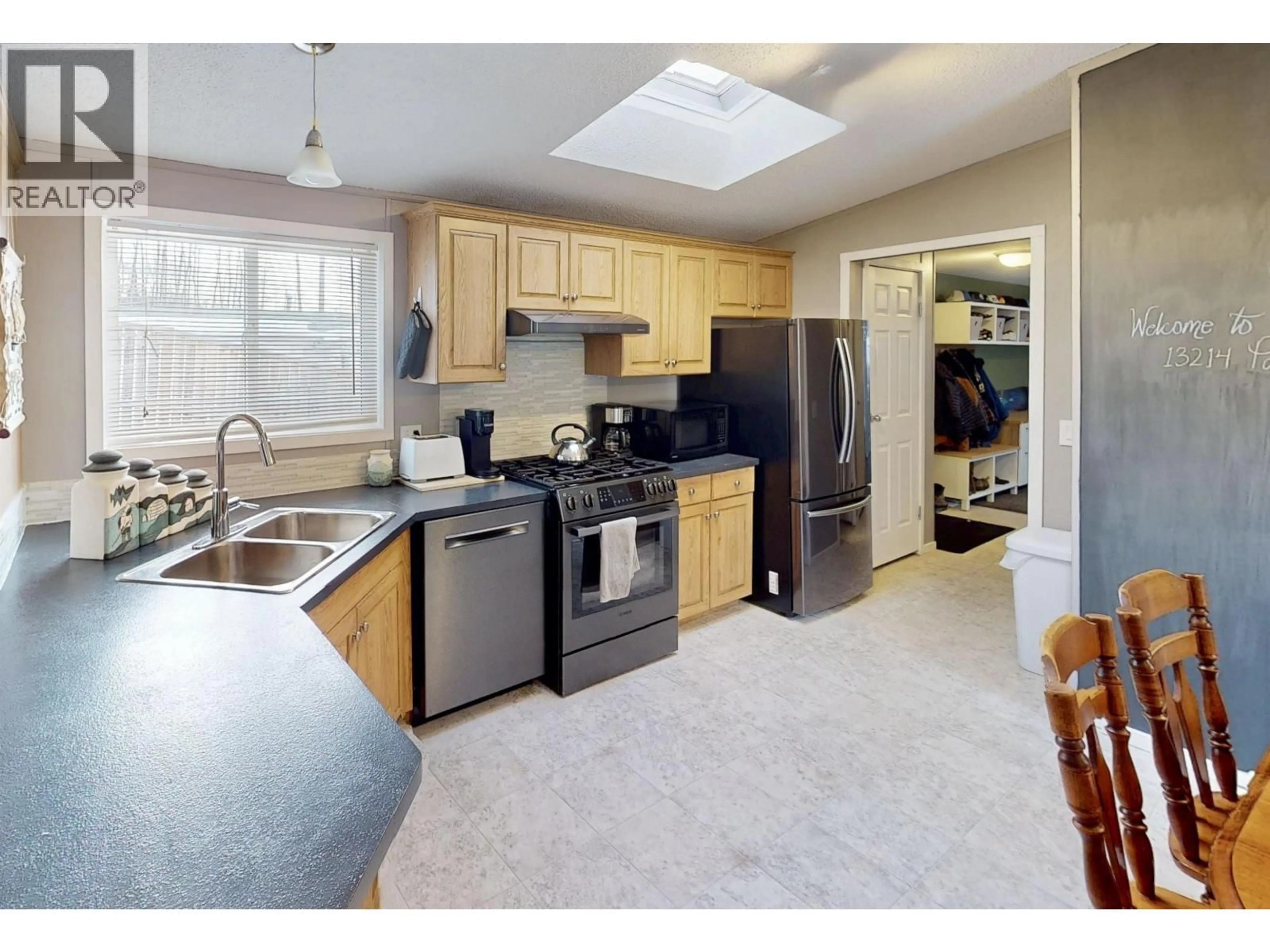 Open concept kitchen, ceramic/tile floor for 13214 PARADISE STREET, Fort St. John British Columbia V0C1H0