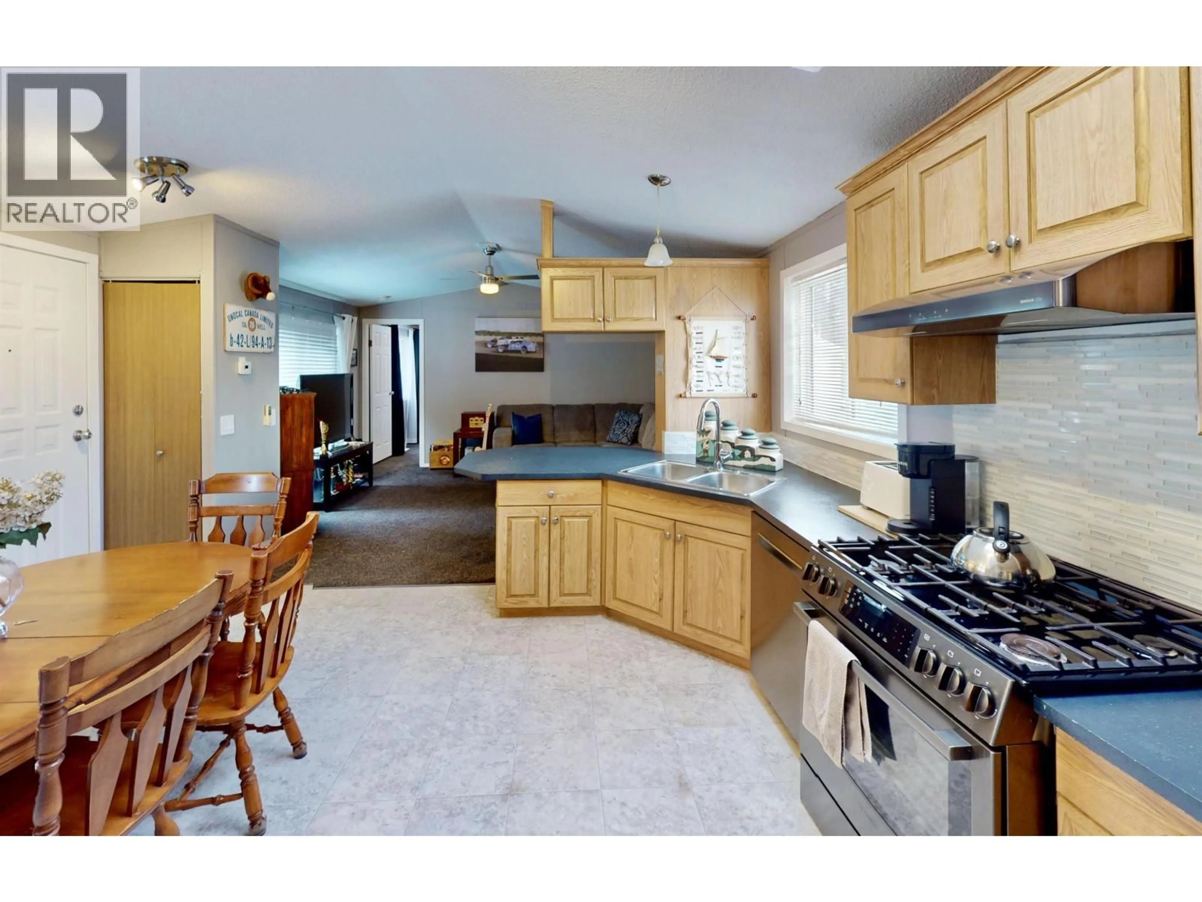 Open concept kitchen, unknown for 13214 PARADISE STREET, Fort St. John British Columbia V0C1H0