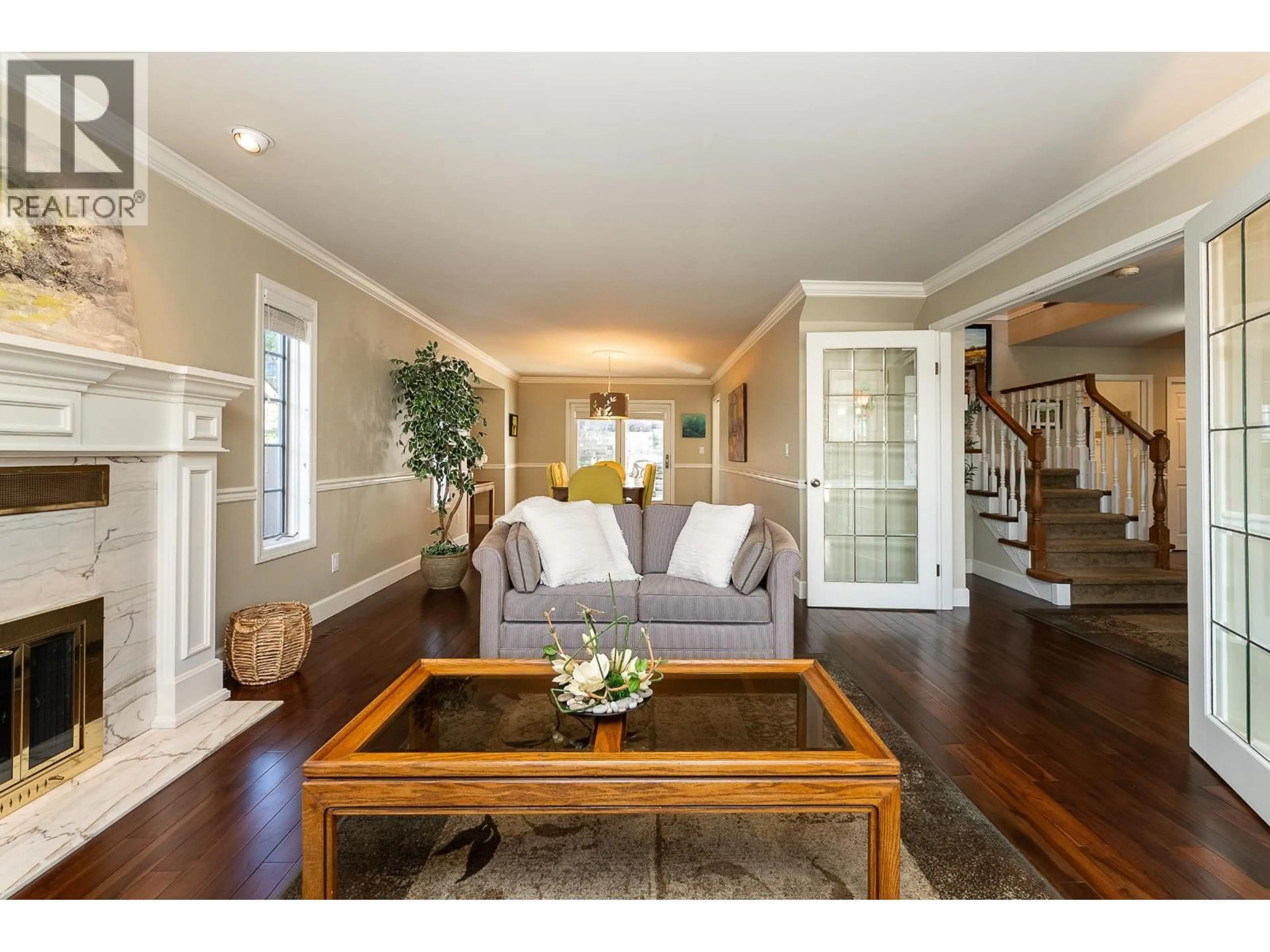 Living room with furniture, wood/laminate floor for 408 RIVERVIEW CRESCENT, Coquitlam British Columbia V3C4X8