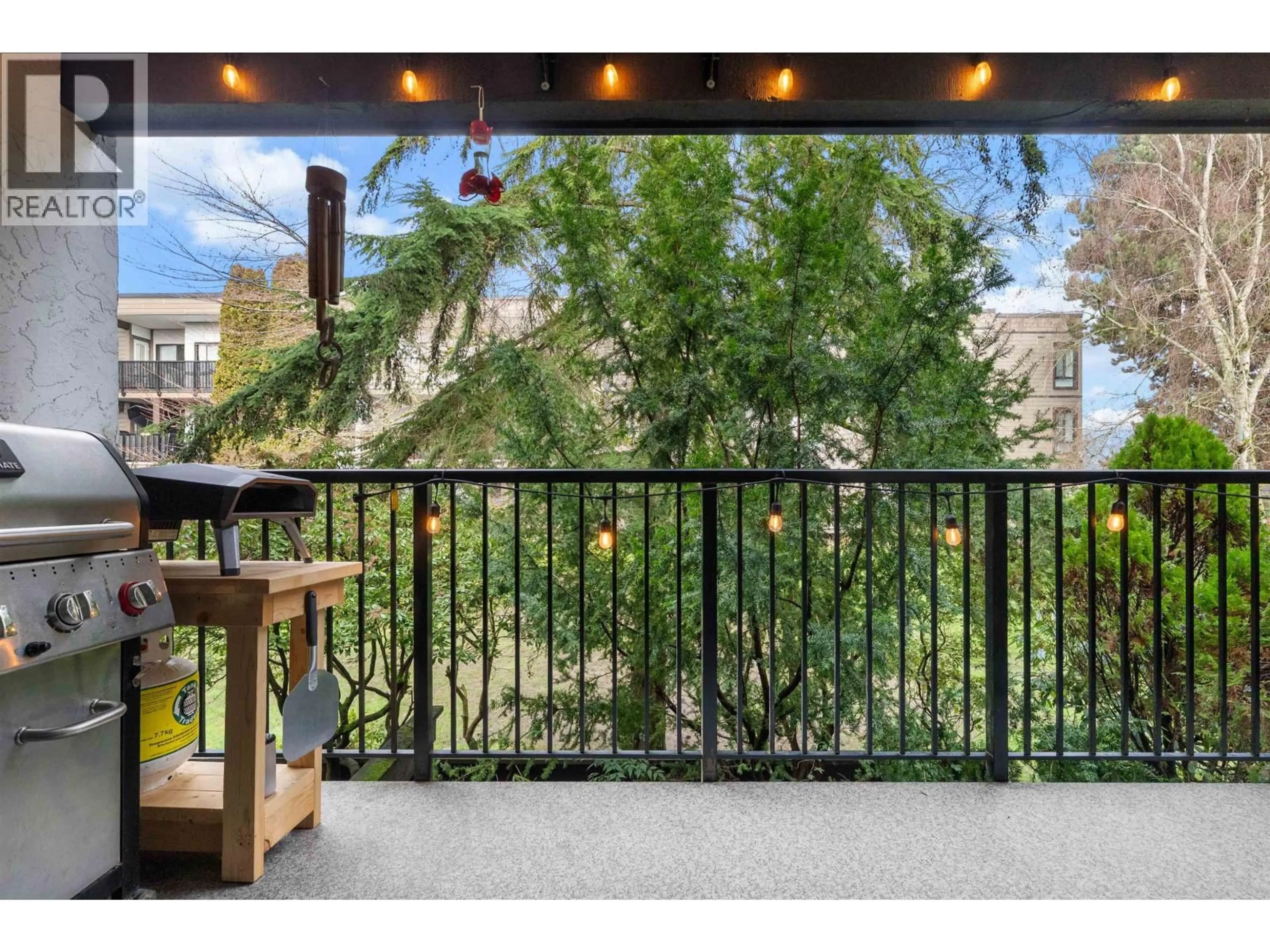 Patio, city buildings view from balcony for 207 - 8840 NO 1 ROAD, Richmond British Columbia V7C4C1