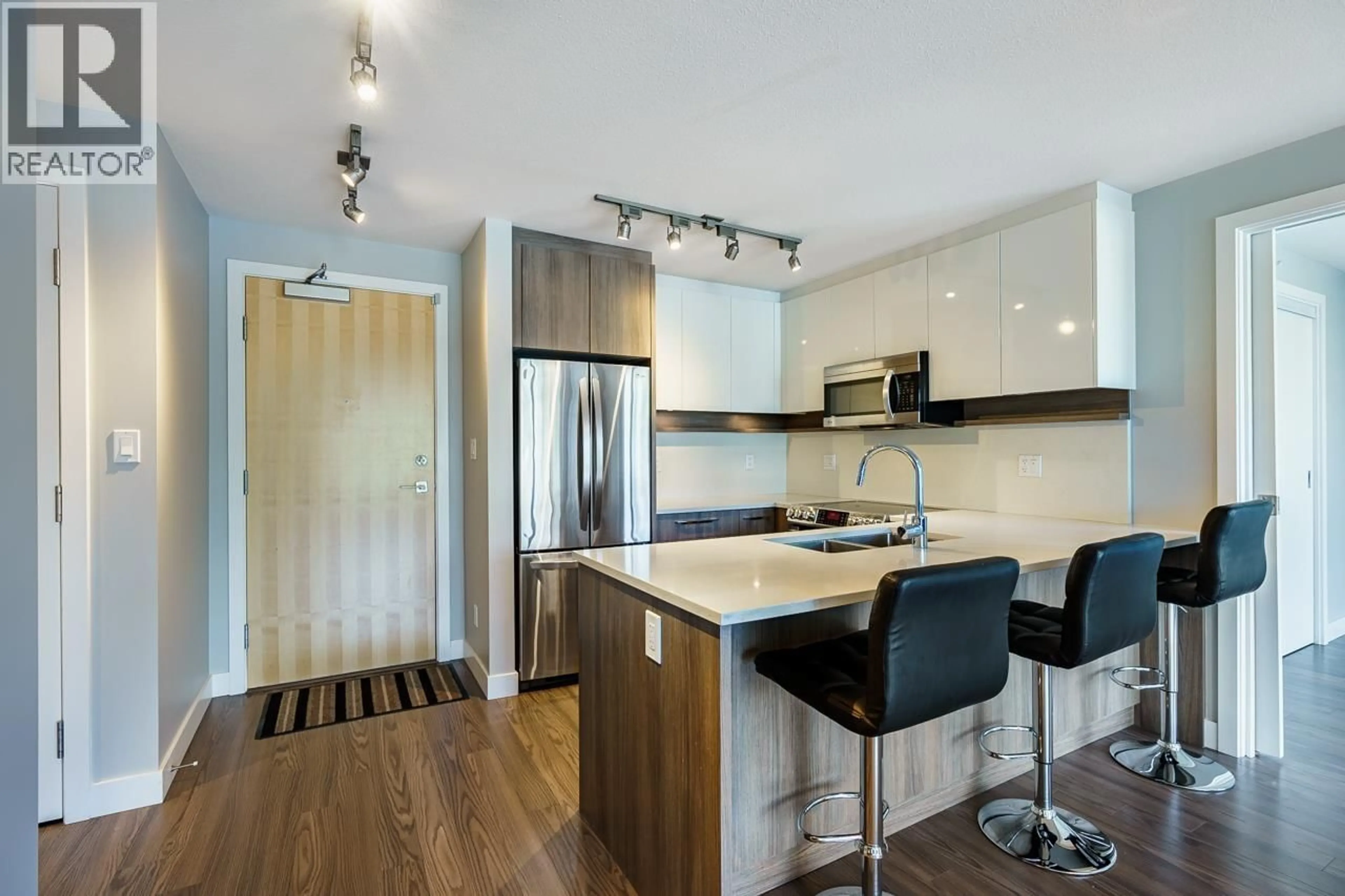 Open concept kitchen, wood/laminate floor for 505 - 958 RIDGEWAY AVENUE, Coquitlam British Columbia V3K0C5