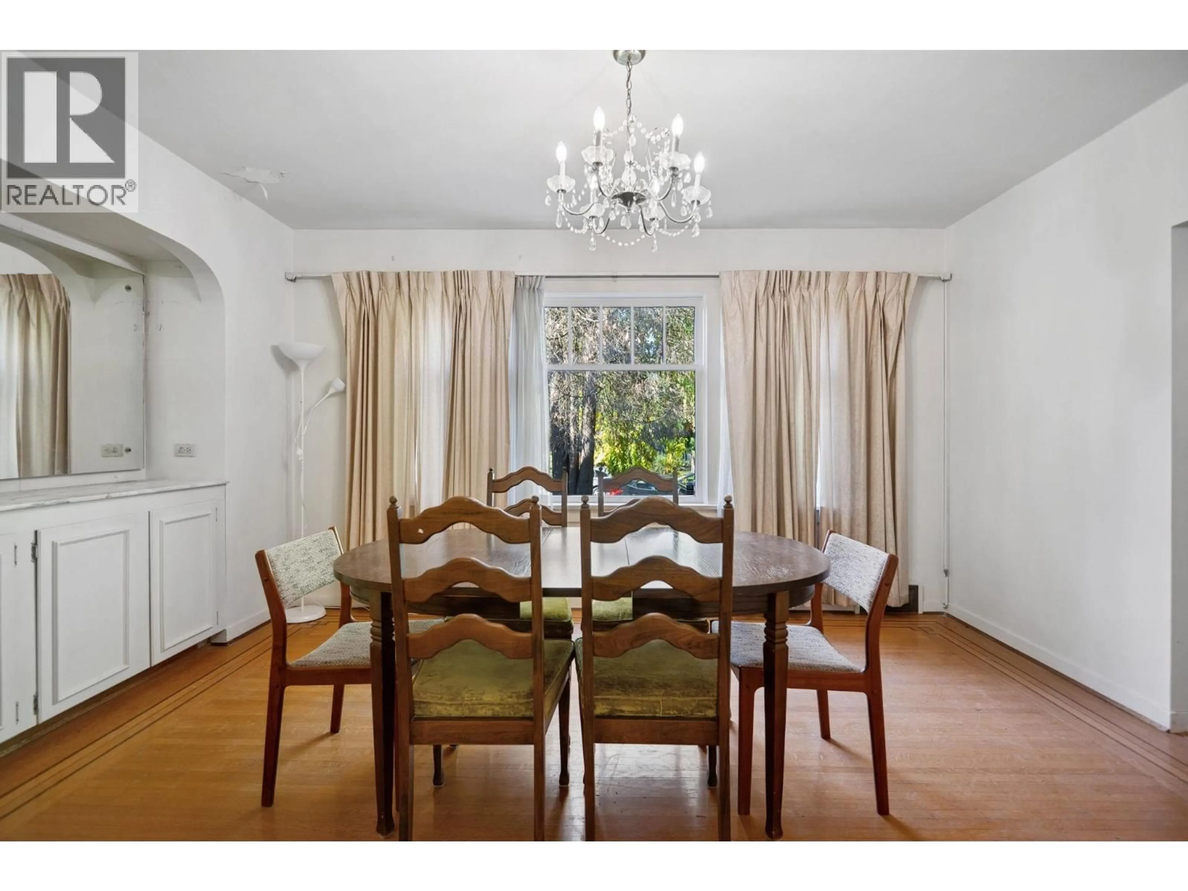 Dining room, wood/laminate floor for 4470 OSLER STREET, Vancouver British Columbia V6H2X9