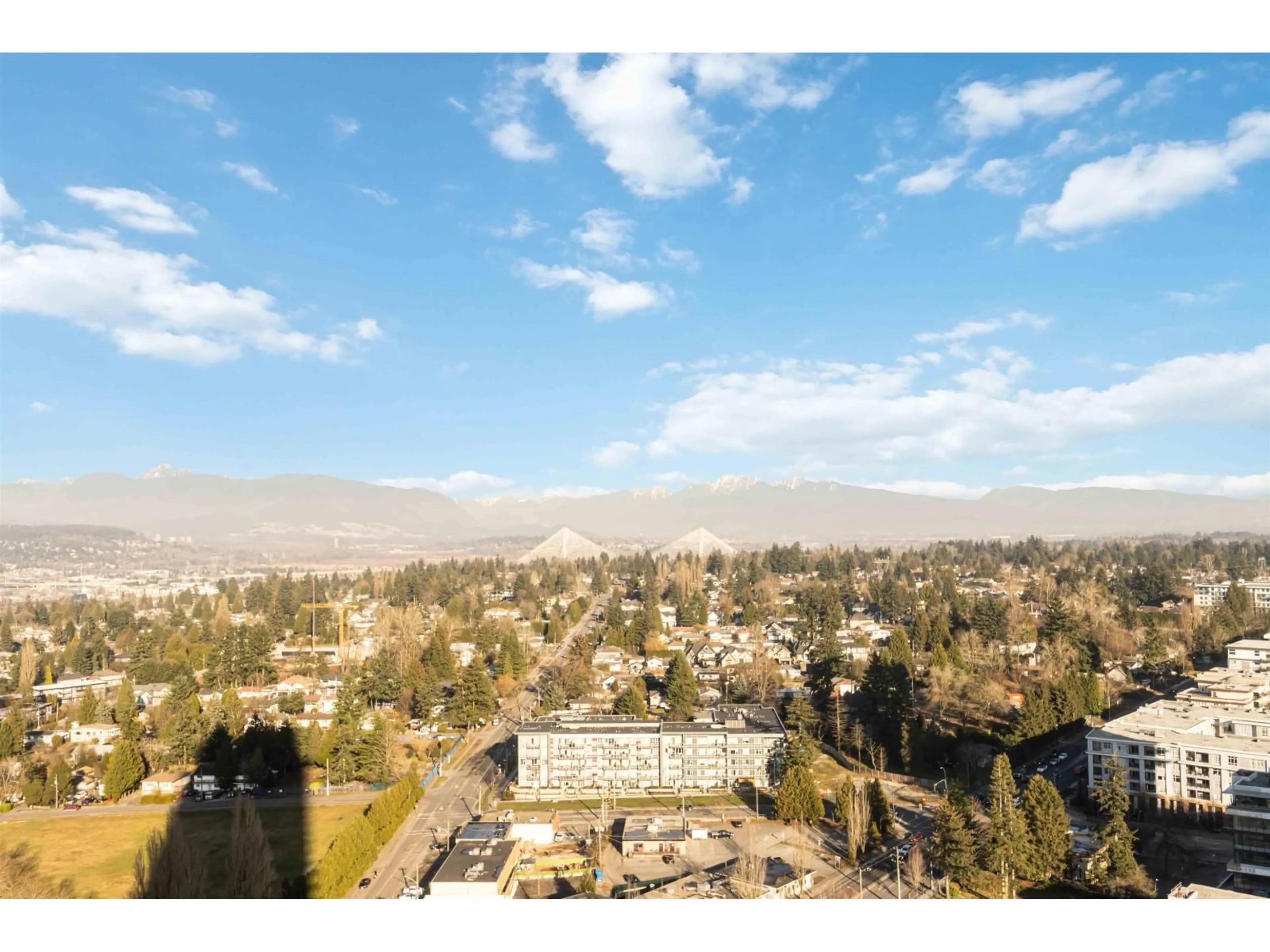 A pic from outside/outdoor area/front of a property/back of a property/a pic from drone, mountain view for 2903 - 10750 135A STREET, Surrey British Columbia V3T0V4