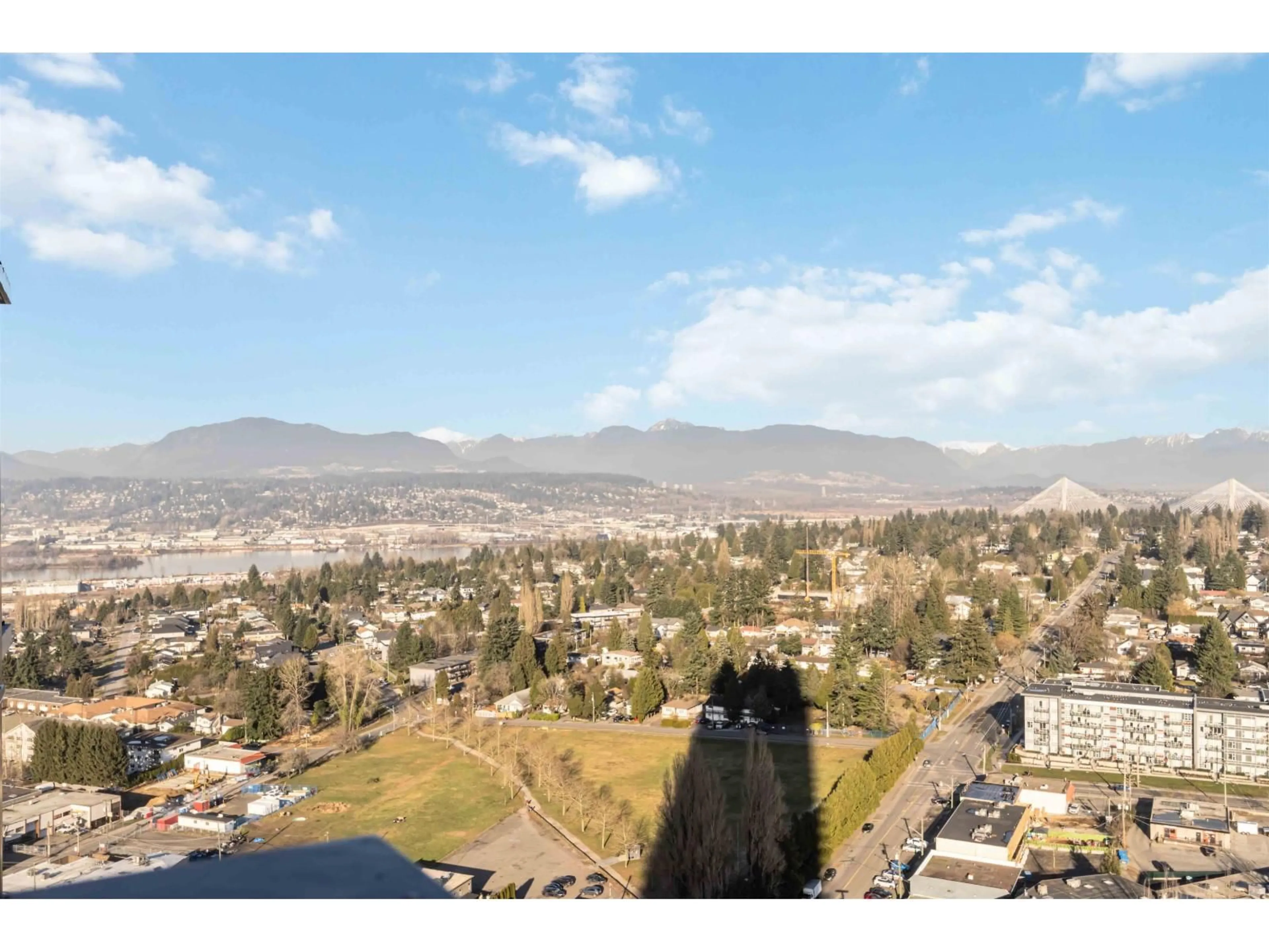 A pic from outside/outdoor area/front of a property/back of a property/a pic from drone, mountain view for 2903 - 10750 135A STREET, Surrey British Columbia V3T0V4