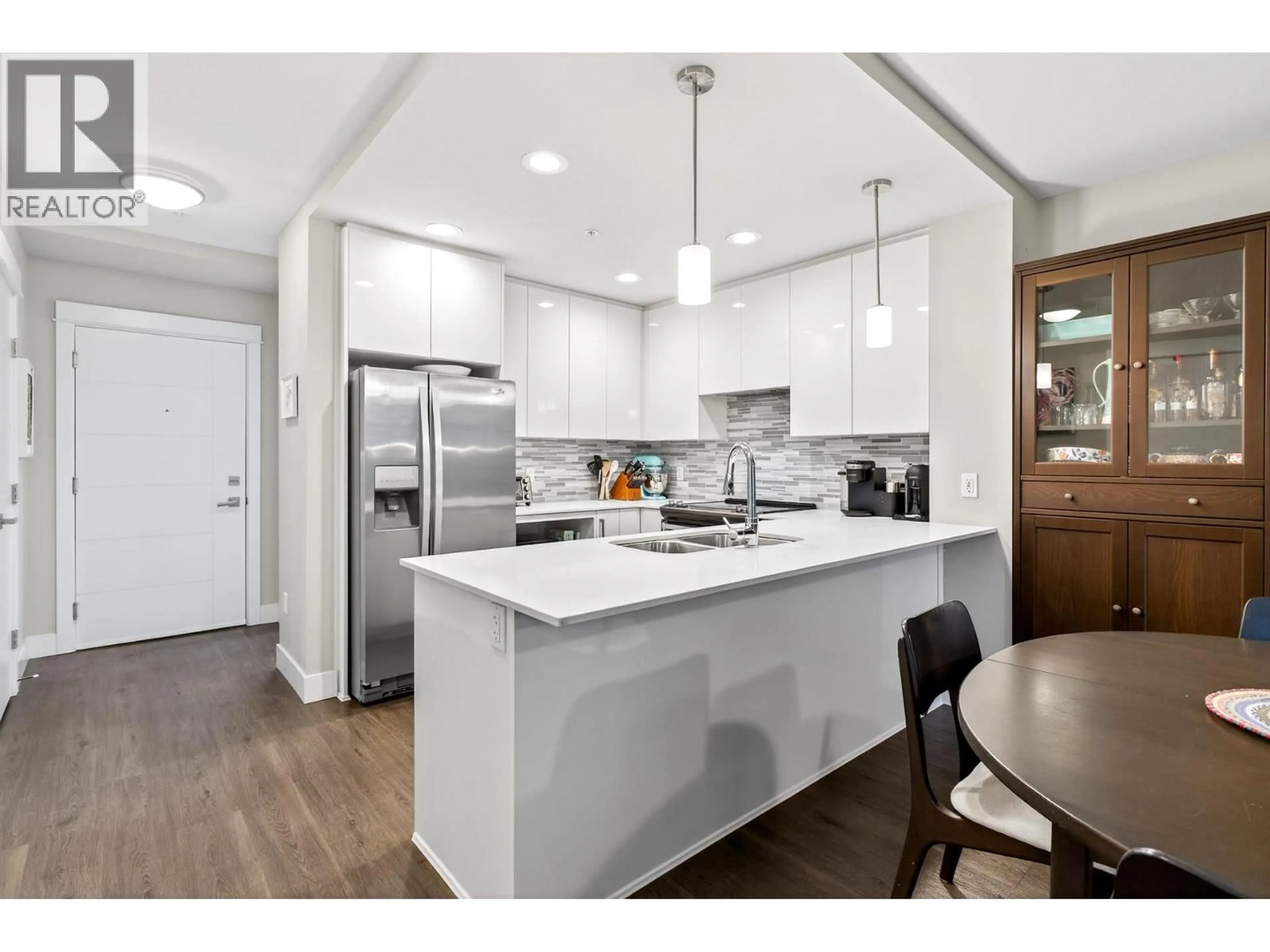 Open concept kitchen, unknown for 103 - 2465 WILSON AVENUE, Port Coquitlam British Columbia V3C0E6