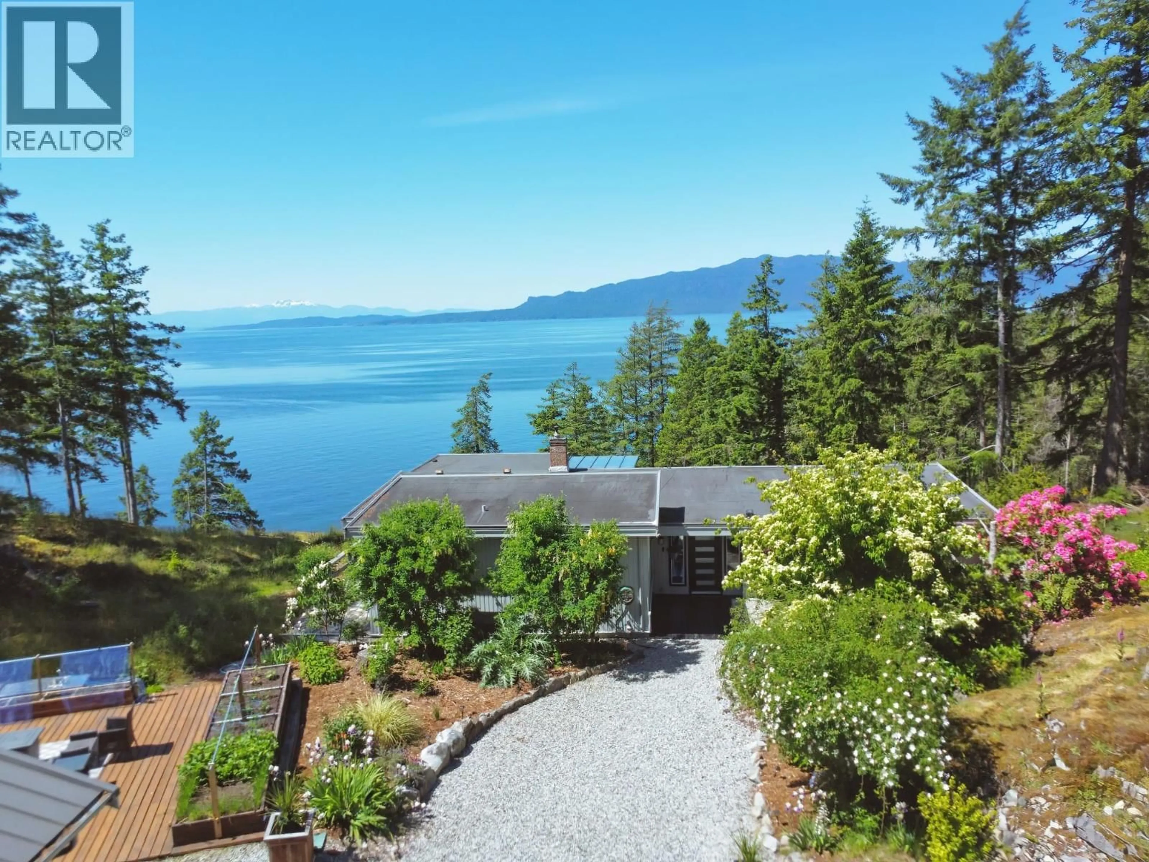 A pic from outside/outdoor area/front of a property/back of a property/a pic from drone, water/lake/river/ocean view for 10991- - 10993 SUNSHINE COAST HIGHWAY, Halfmoon Bay British Columbia V7Z1B8