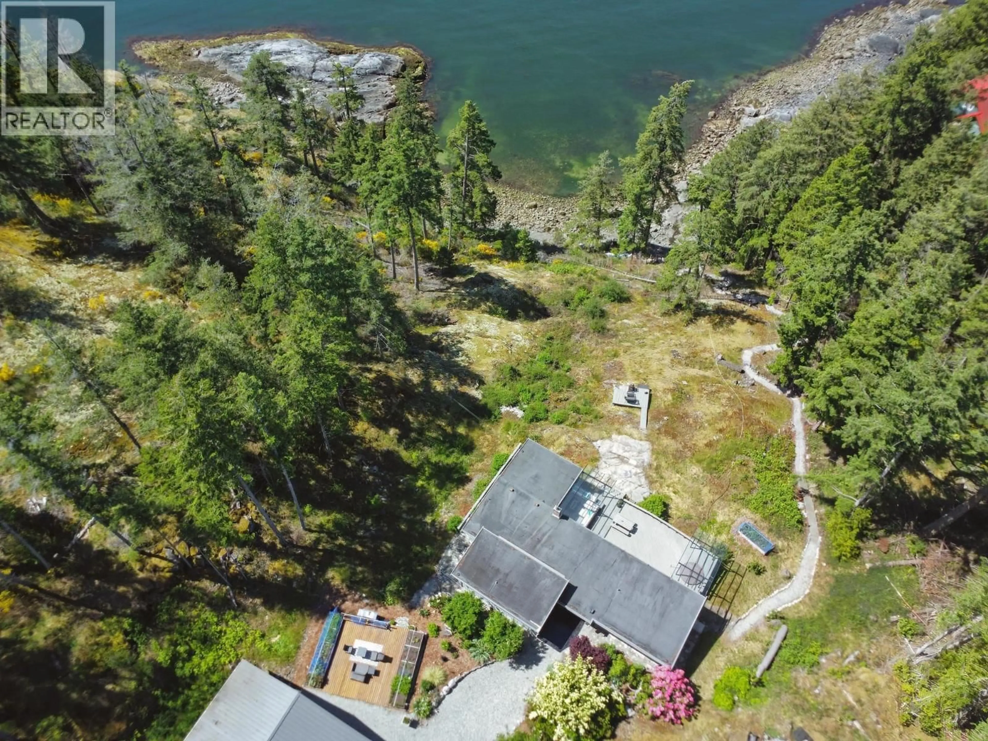 A pic from outside/outdoor area/front of a property/back of a property/a pic from drone, water/lake/river/ocean view for 10991- - 10993 SUNSHINE COAST HIGHWAY, Halfmoon Bay British Columbia V7Z1B8