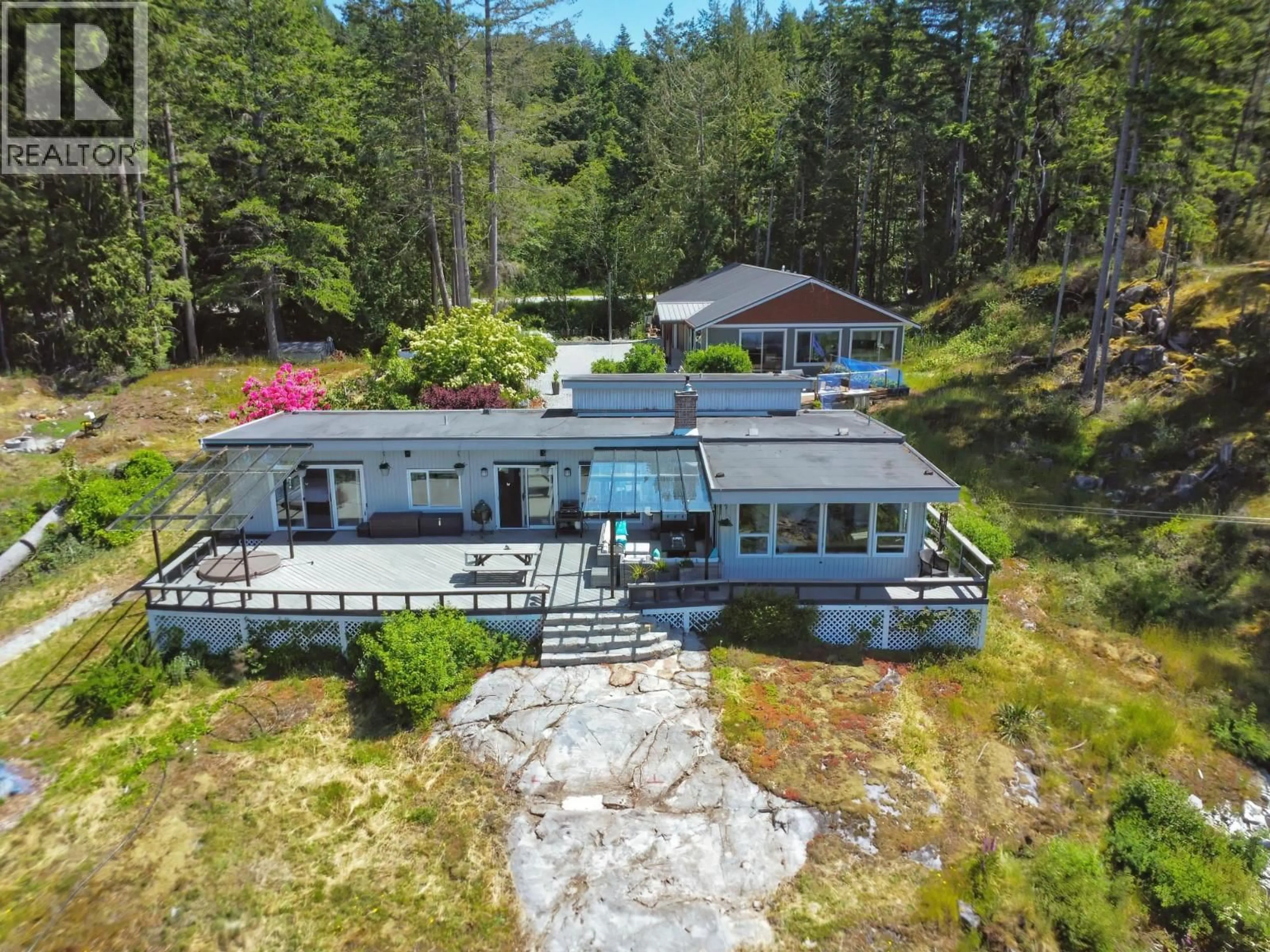 A pic from outside/outdoor area/front of a property/back of a property/a pic from drone, water/lake/river/ocean view for 10991- - 10993 SUNSHINE COAST HIGHWAY, Halfmoon Bay British Columbia V7Z1B8
