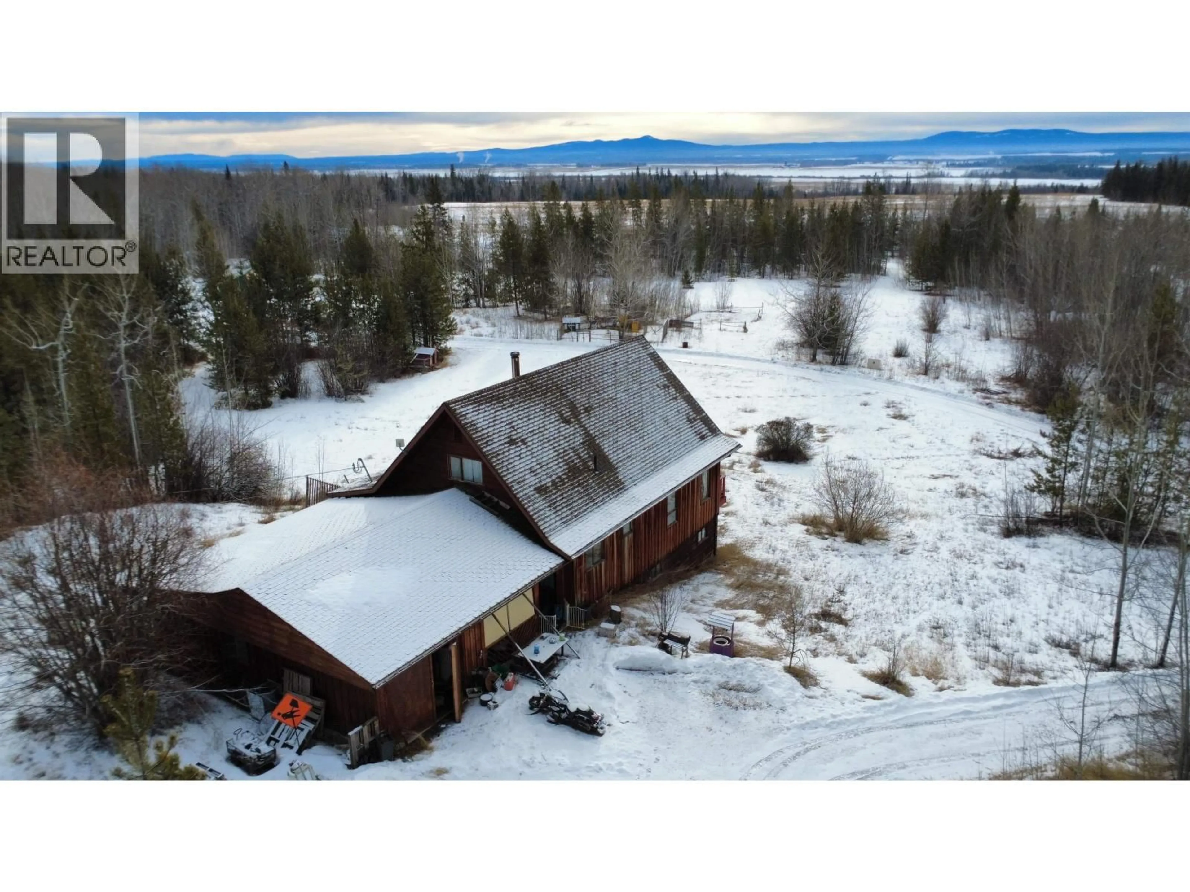 A pic from outside/outdoor area/front of a property/back of a property/a pic from drone, mountain view for 12539 27 HIGHWAY, Vanderhoof British Columbia V0J3A0
