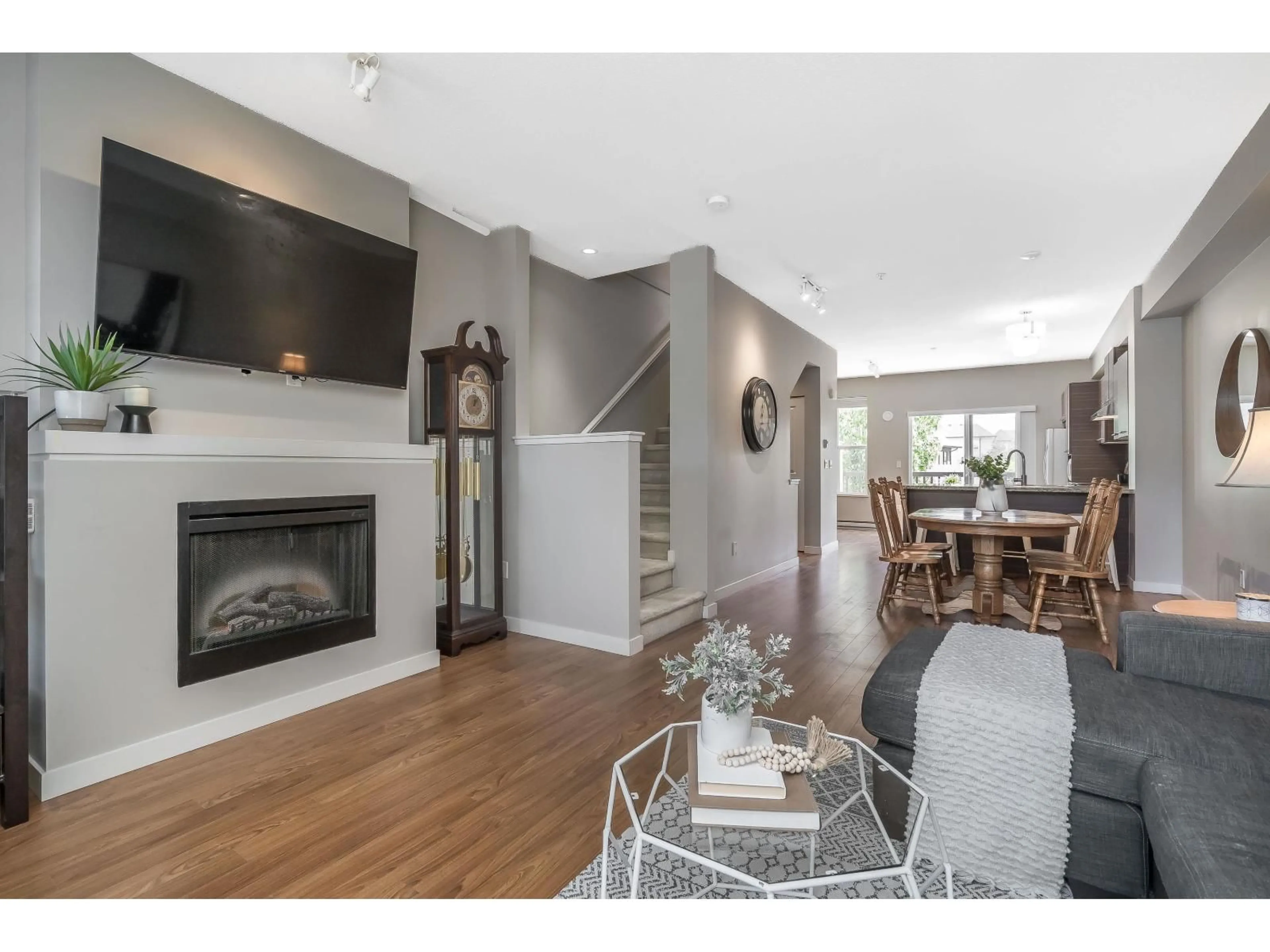 Living room with furniture, wood/laminate floor for 170 - 7938 209 STREET, Langley British Columbia V2Y0K1