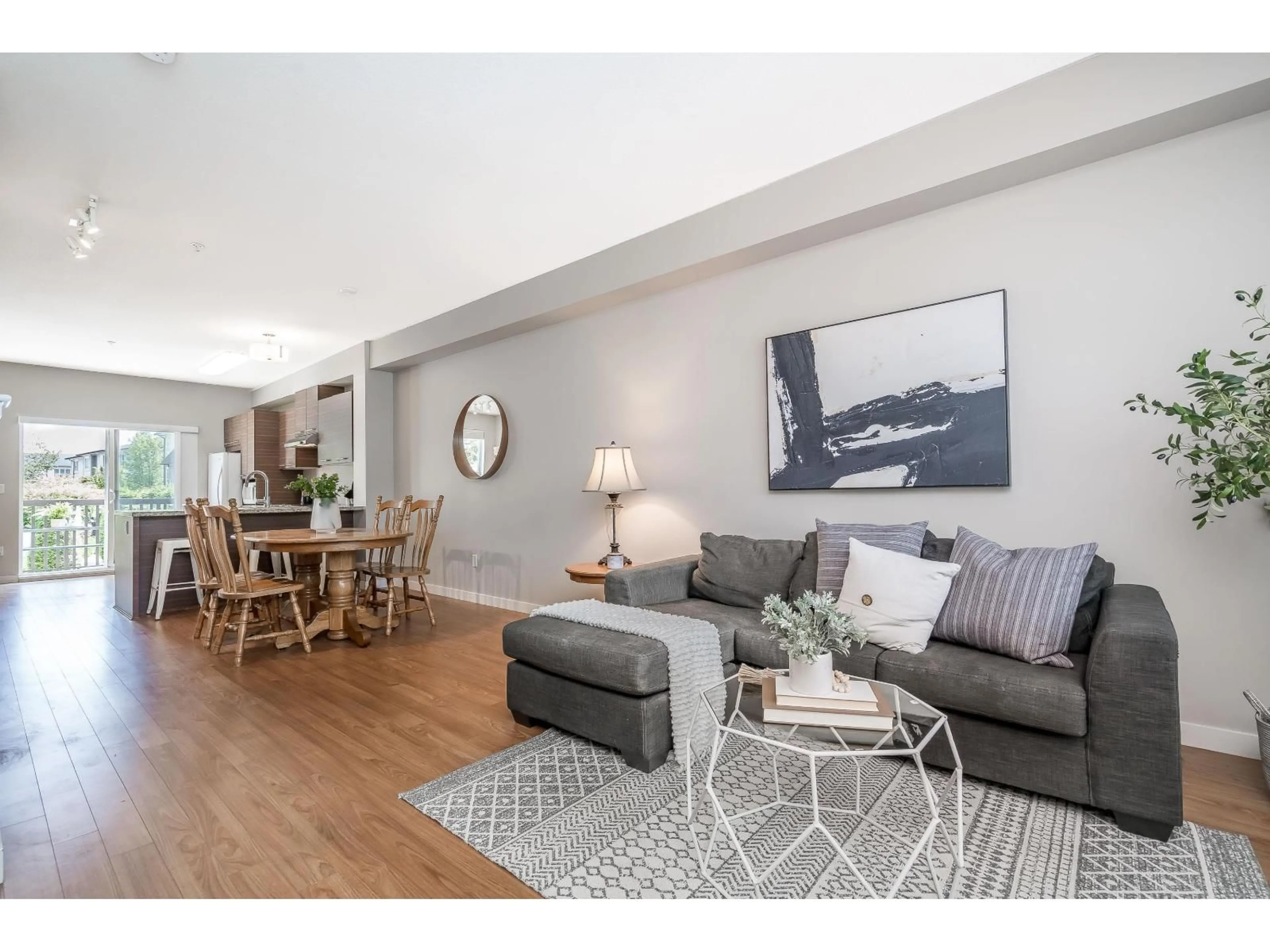 Living room with furniture, wood/laminate floor for 170 - 7938 209 STREET, Langley British Columbia V2Y0K1