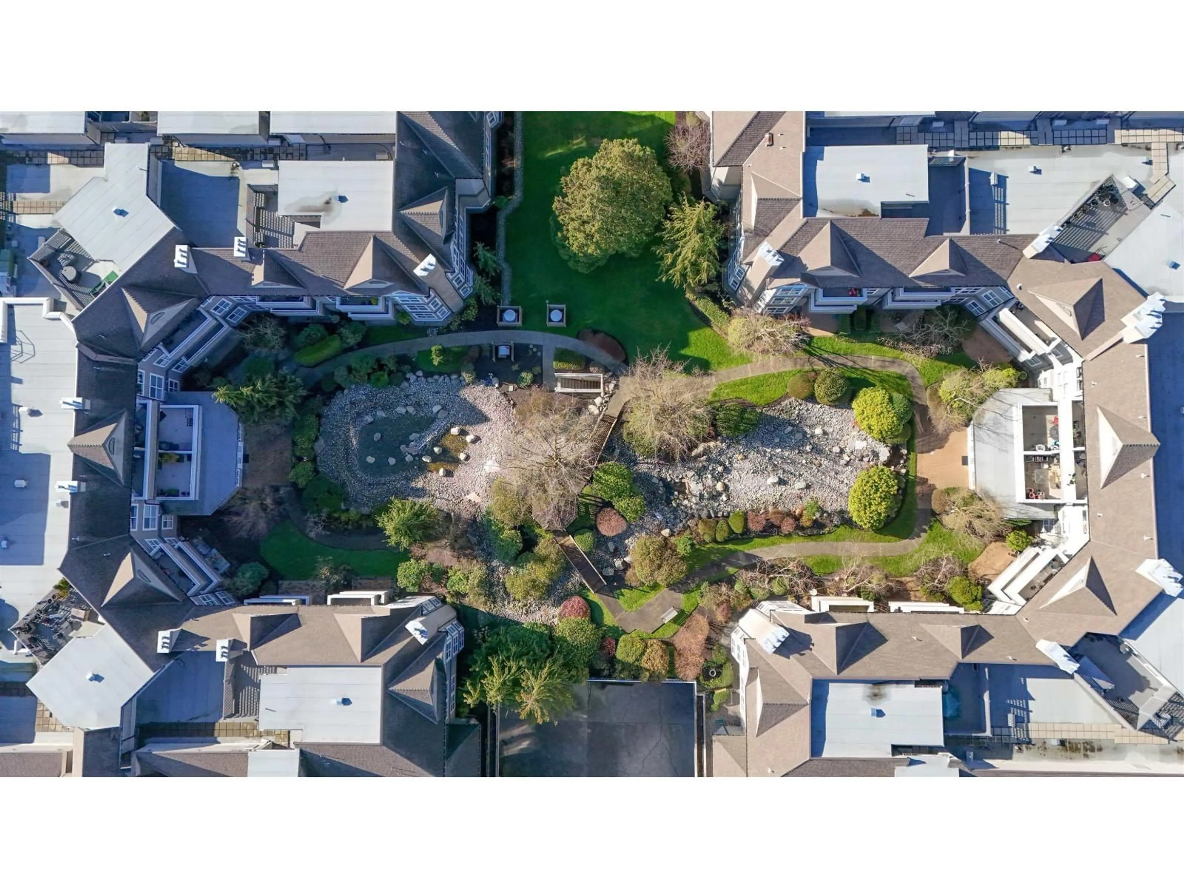 A pic from outside/outdoor area/front of a property/back of a property/a pic from drone, street for 212 - 6557 121 STREET, Surrey British Columbia V3W1E7