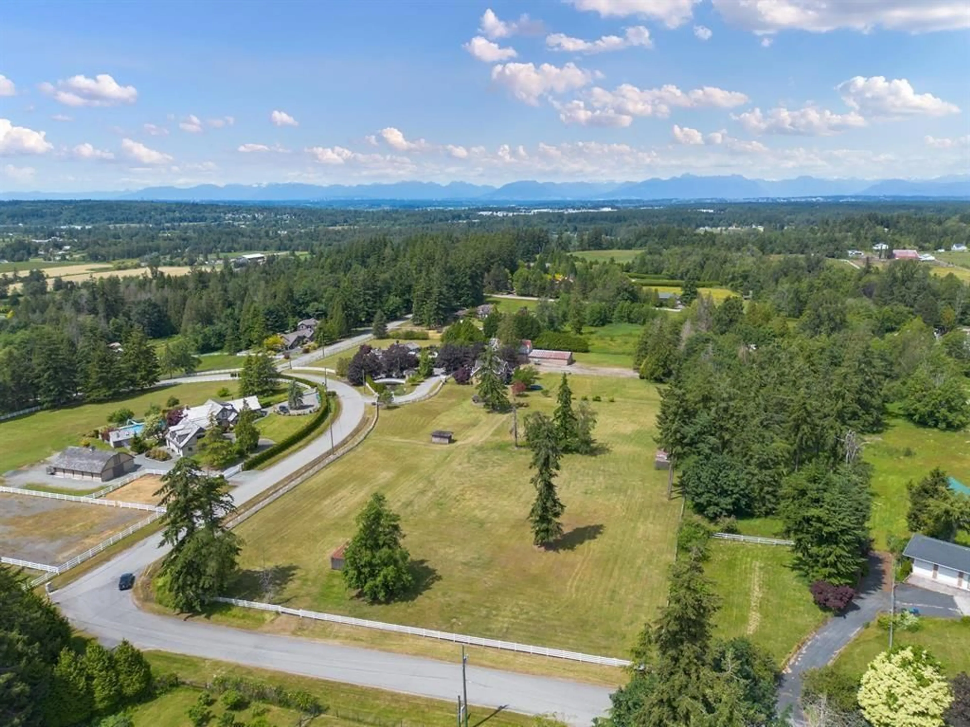 A pic from outside/outdoor area/front of a property/back of a property/a pic from drone, mountain view for 382 194 STREET, Surrey British Columbia V3Z9R9