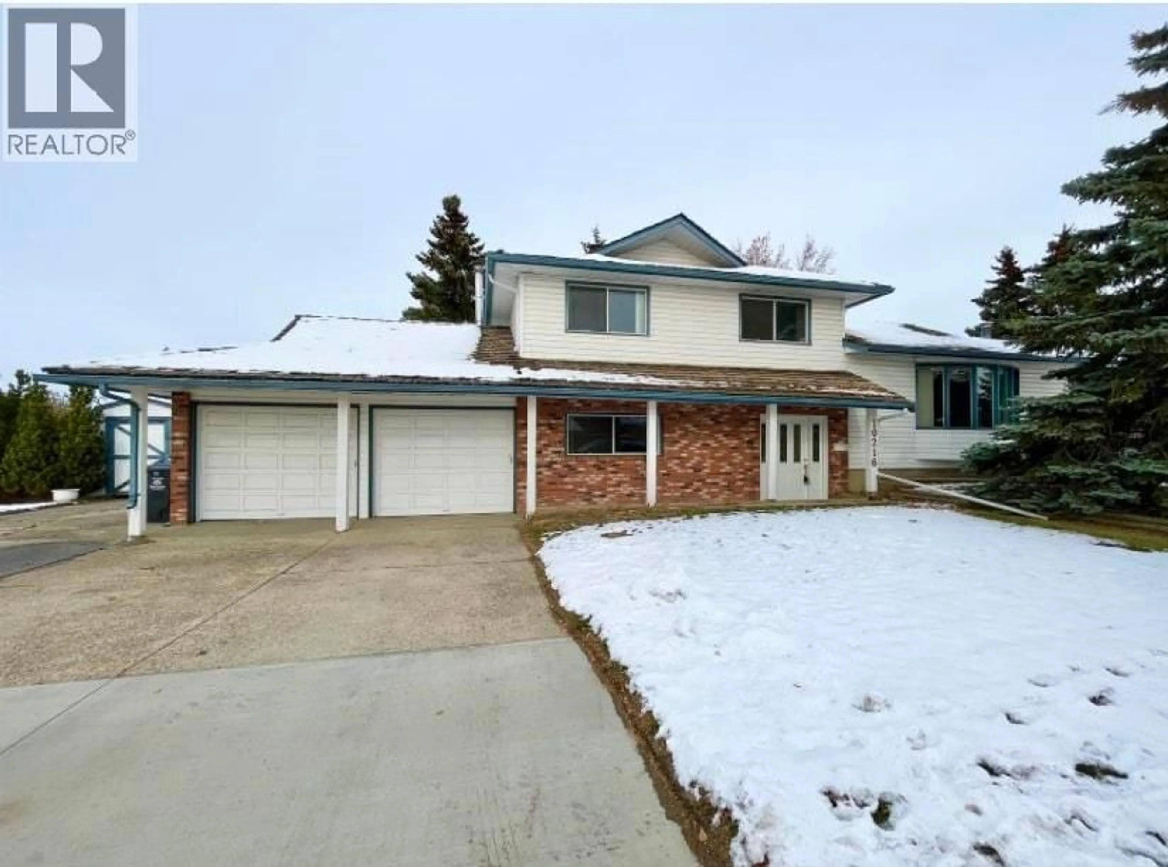 A pic from outside/outdoor area/front of a property/back of a property/a pic from drone, street for 10216 113 AVENUE, Fort St. John British Columbia V1J5N2