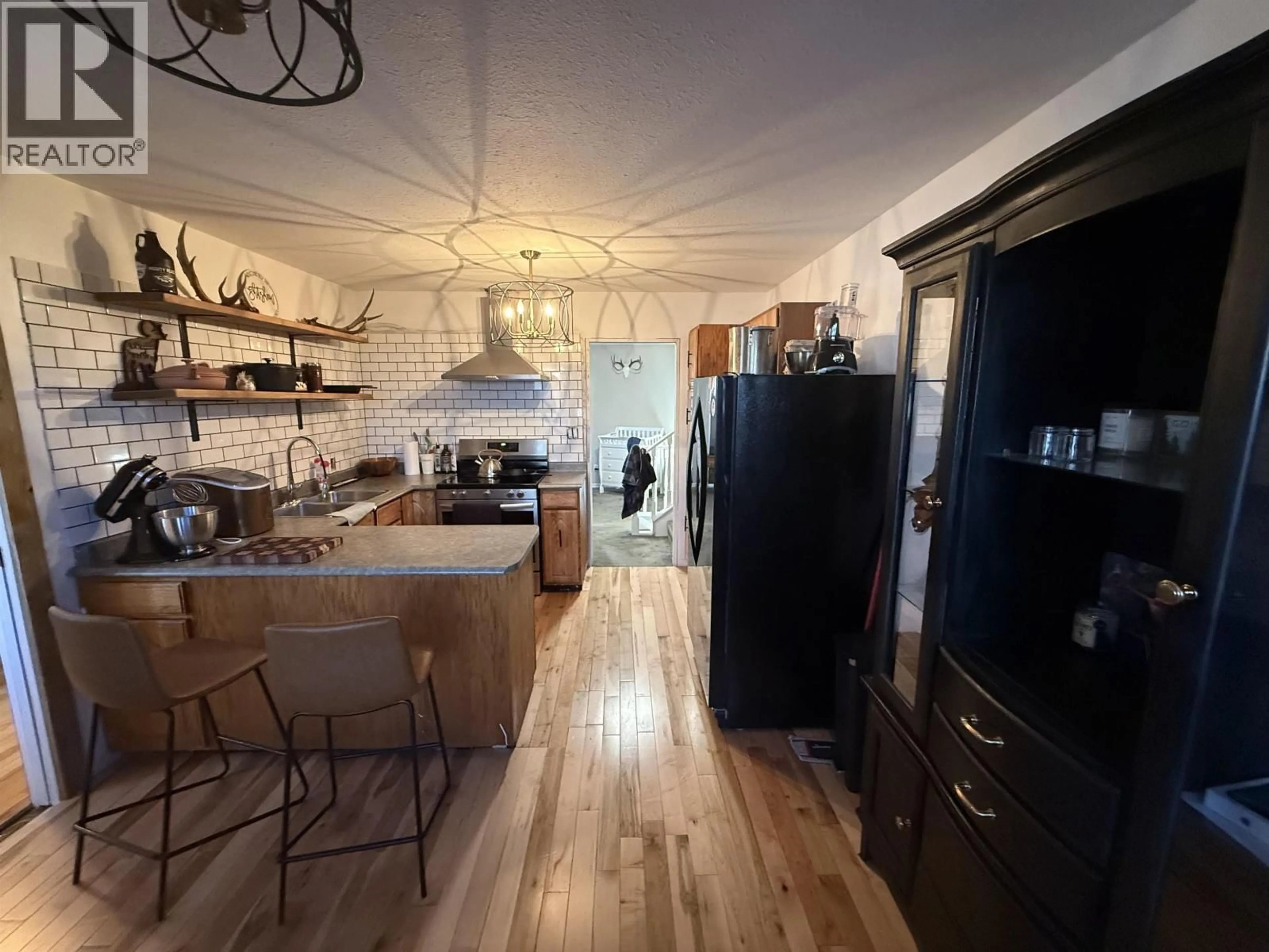 Open concept kitchen, unknown for 10216 113 AVENUE, Fort St. John British Columbia V1J5N2